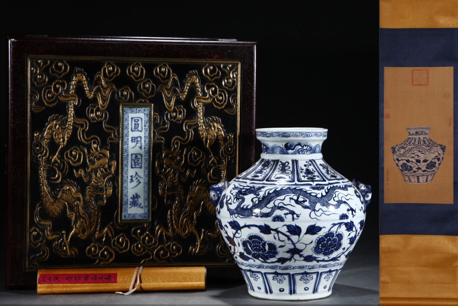 A Rare Blue and White Flower and Dragon Pattern Beast-Ears Jar,with Chinese Vertical Scroll Ink: A Rare Blue and White Flower and Dragon Pattern Beast-Ears Jar,with Chinese Vertical Scroll Ink Painting on Silk,Yuan Dynasty,China,Size:(Without frame)24.2inx12.4in,(Porcelain)14.3inx13.6in 青&