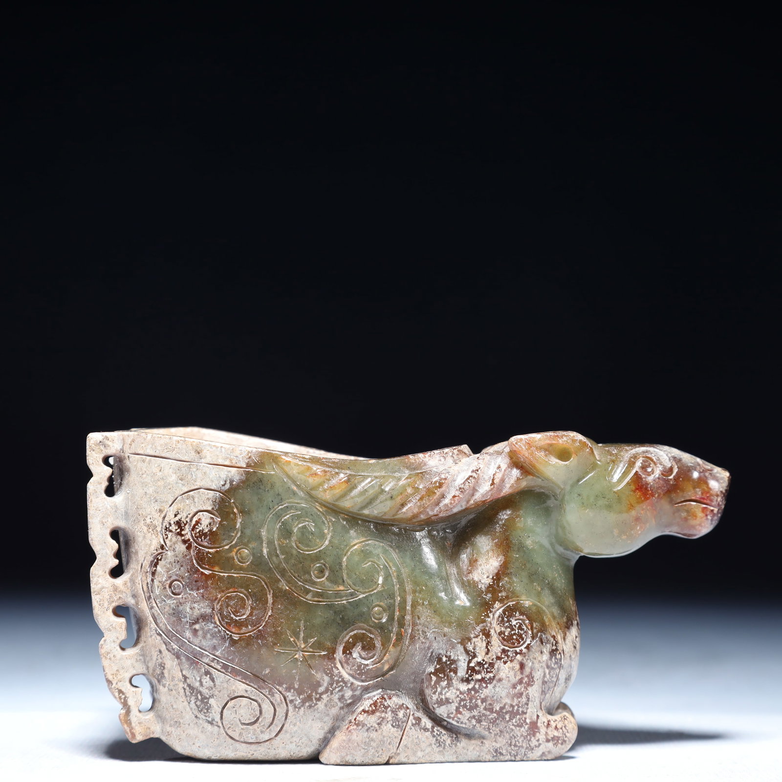 An Exquisite Green Jade Auspicious Cloud Pattern Buffalo Ornament: An Exquisite Green Jade Auspicious Cloud Pattern Buffalo Ornament,Qing Dynasty,China,Size:4.3inx2inx2.6in,Weight:350g 青玉祥云纹牛摆件,中国&