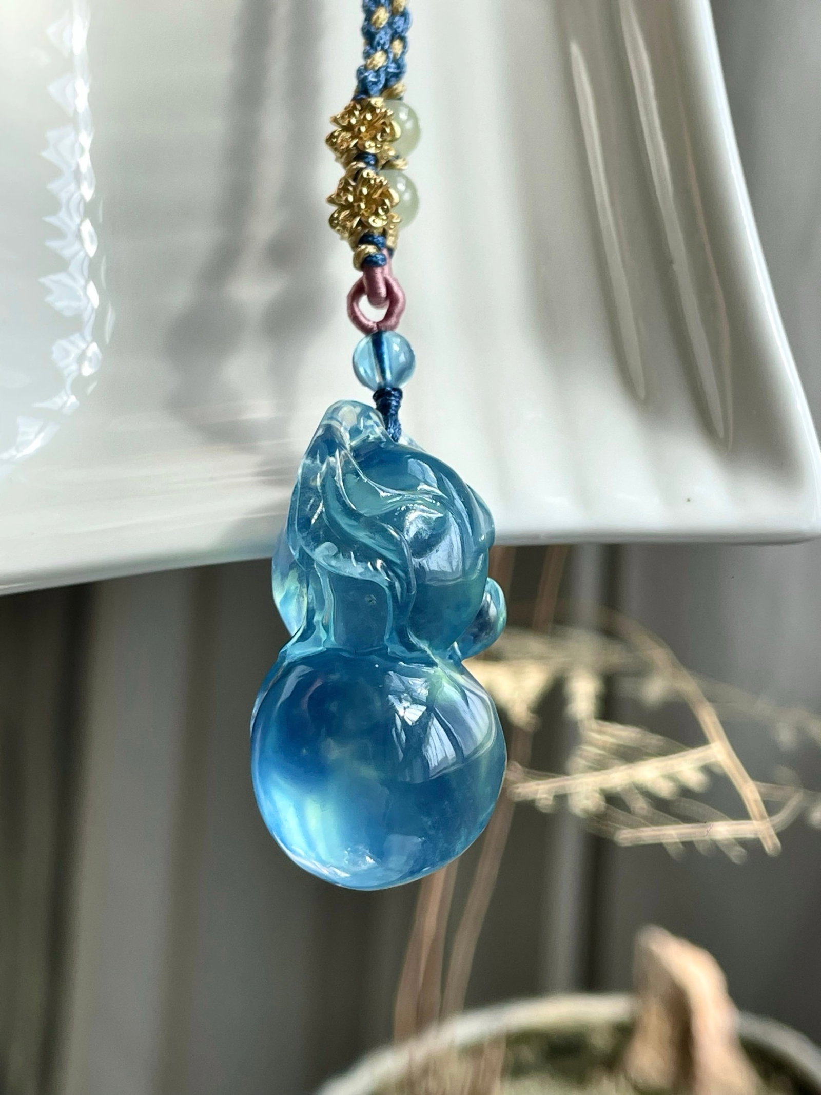 An Exquisite Aquamarine Gourd Pendant: An Exquisite Aquamarine Gourd Pendant,Size:36mmx21mmx17mm,Total Weight:18.3g 海蓝宝葫芦吊坠