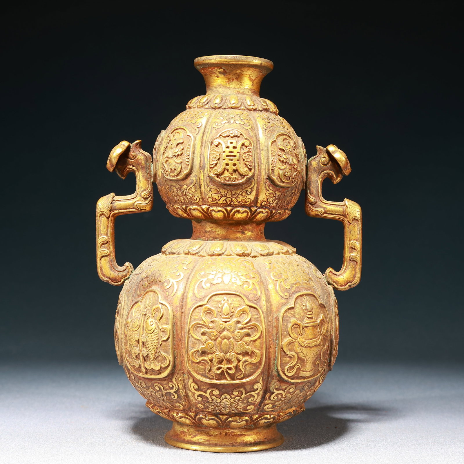 An Exquisite Gilt Bronze Eight Treasures Bats and Peach Pattern Ruyi-Ears Gourd Vase (1 of 10)