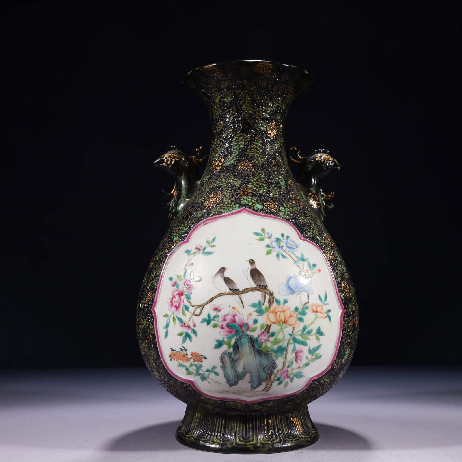 An Exquisite Bronze Glazed Famille-Rose Flower and Bird Pattern Phoenix-Ears Vase: An Exquisite Bronze Glazed Famille-Rose Flower and Bird Pattern Phoenix-Ears Vase,Qing Dynasty,China,Qianlong Six-character Mark,Size:7.5inx14.2in,Weight:3050g 古铜釉粉彩