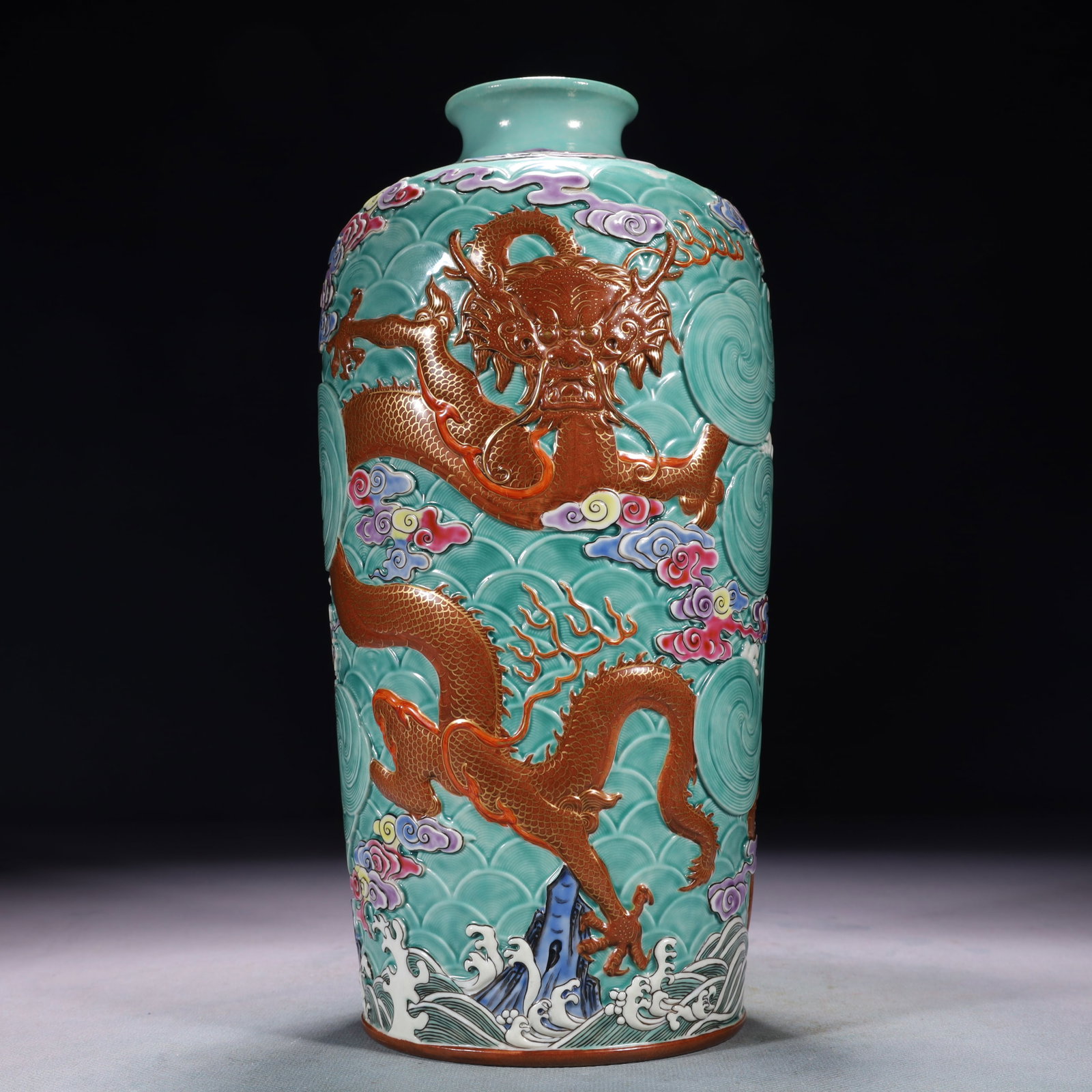 An Exquisite Turquoise Glazed Famille-Rose Seawater and Dragon Pattern Vase: An Exquisite Turquoise Glazed Famille-Rose Seawater and Dragon Pattern Vase,Qing Dynasty,China,Qianlong Six-character Mark,Size:4.3inx10.6in,Weight:1650g 松石绿釉粉ঊ