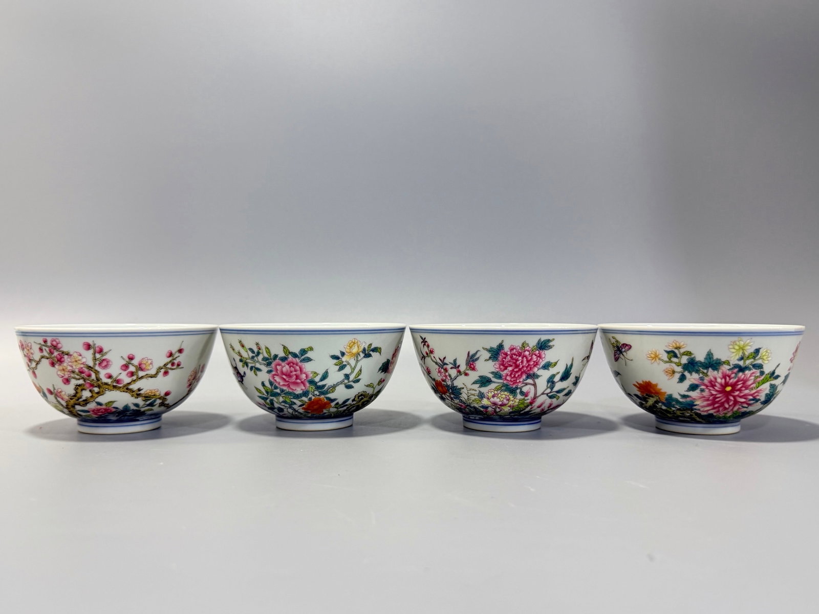A Set of Fine Famille-Rose Flower and Butterfly Pattern Bowls,with poem: A Set of Fine Famille-Rose Flower and Butterfly Pattern Bowls,with poem,Qing Dynasty,China,Yongzheng Six-character Mark,Size:2.3inx4.2in 一套粉彩花卉蝴蝶
