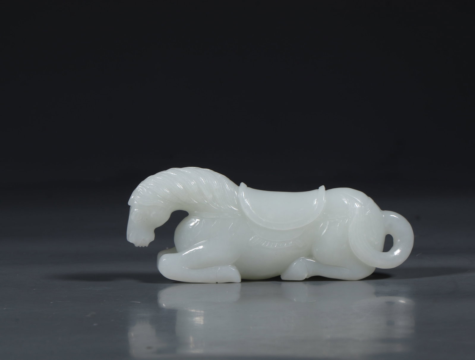 An Exquisite White Jade Horse Ornament: An Exquisite White Jade Horse Ornament,Qing Dynasty,China,Size:3.7inx0.8inx1.6in,Weight:107.4g 白玉马摆件,中国清代