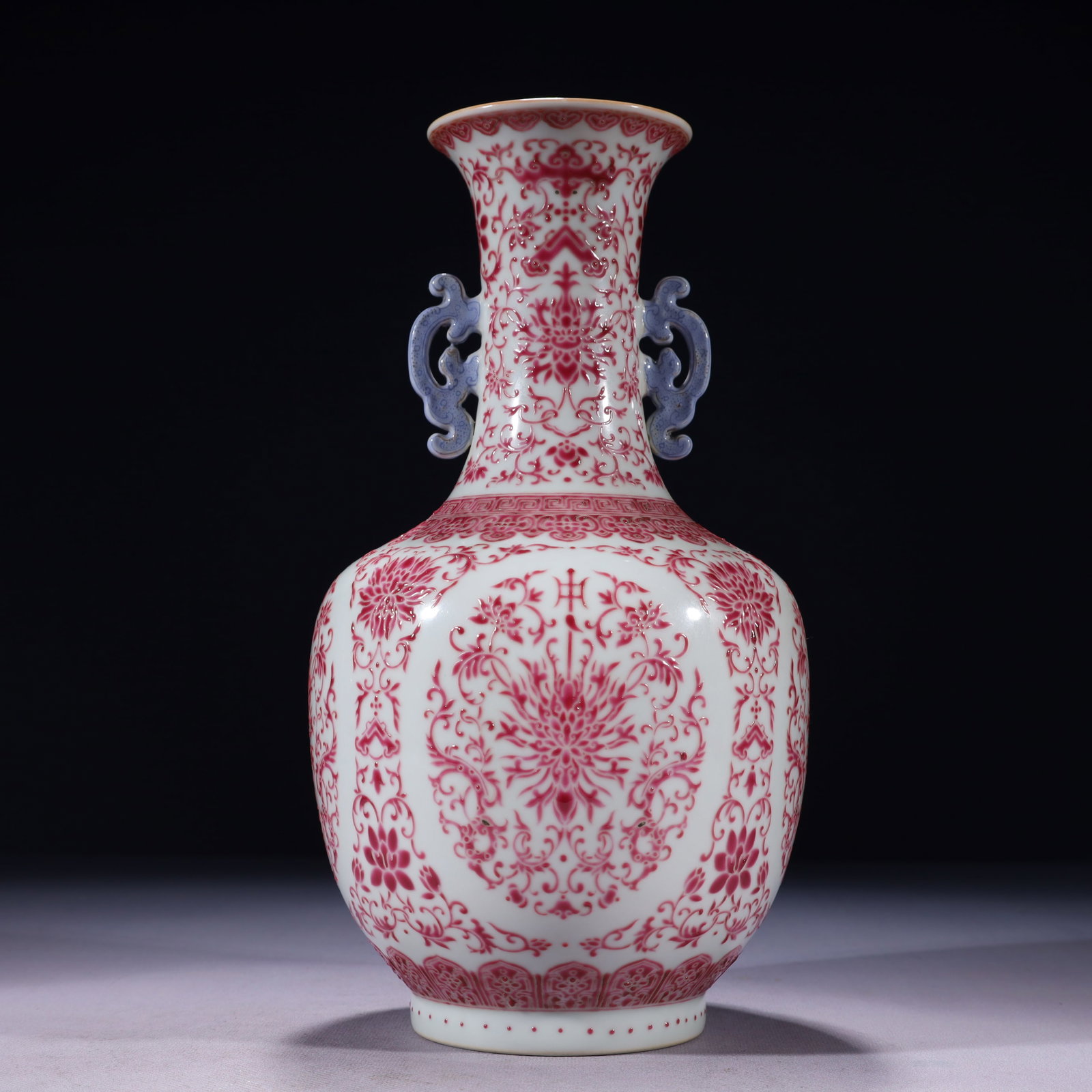 An Exquisite Ruby Red-Glazed Lotus Pattern Double-Ears Vase: An Exquisite Ruby Red-Glazed Lotus Pattern Double-Ears Vase,Qing Dynasty,China,Qianlong Six-character Mark,Size:5.9inx11.6in,Weight:1200g 胭脂红缠枝莲纹ࡡ
