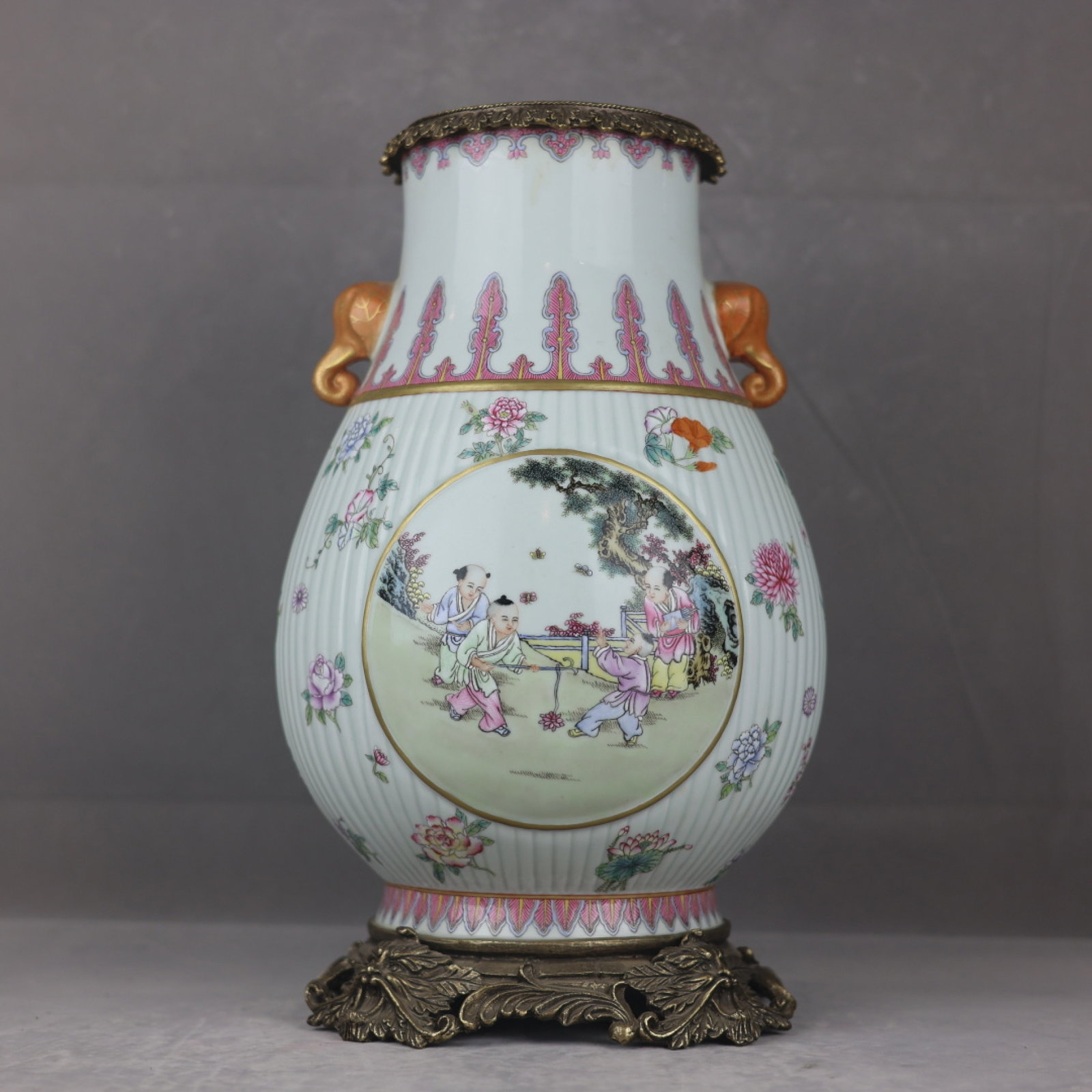 A Huge Famille-Rose Inlaid Bronze Character and Story Pattern Elephant-Ears Vase: A Huge Famille-Rose Inlaid Bronze Character and Story Pattern Elephant-Ears Vase,Qing Dynasty,China,Qianlong Six-character Mark,Size:16.9inx9.8in