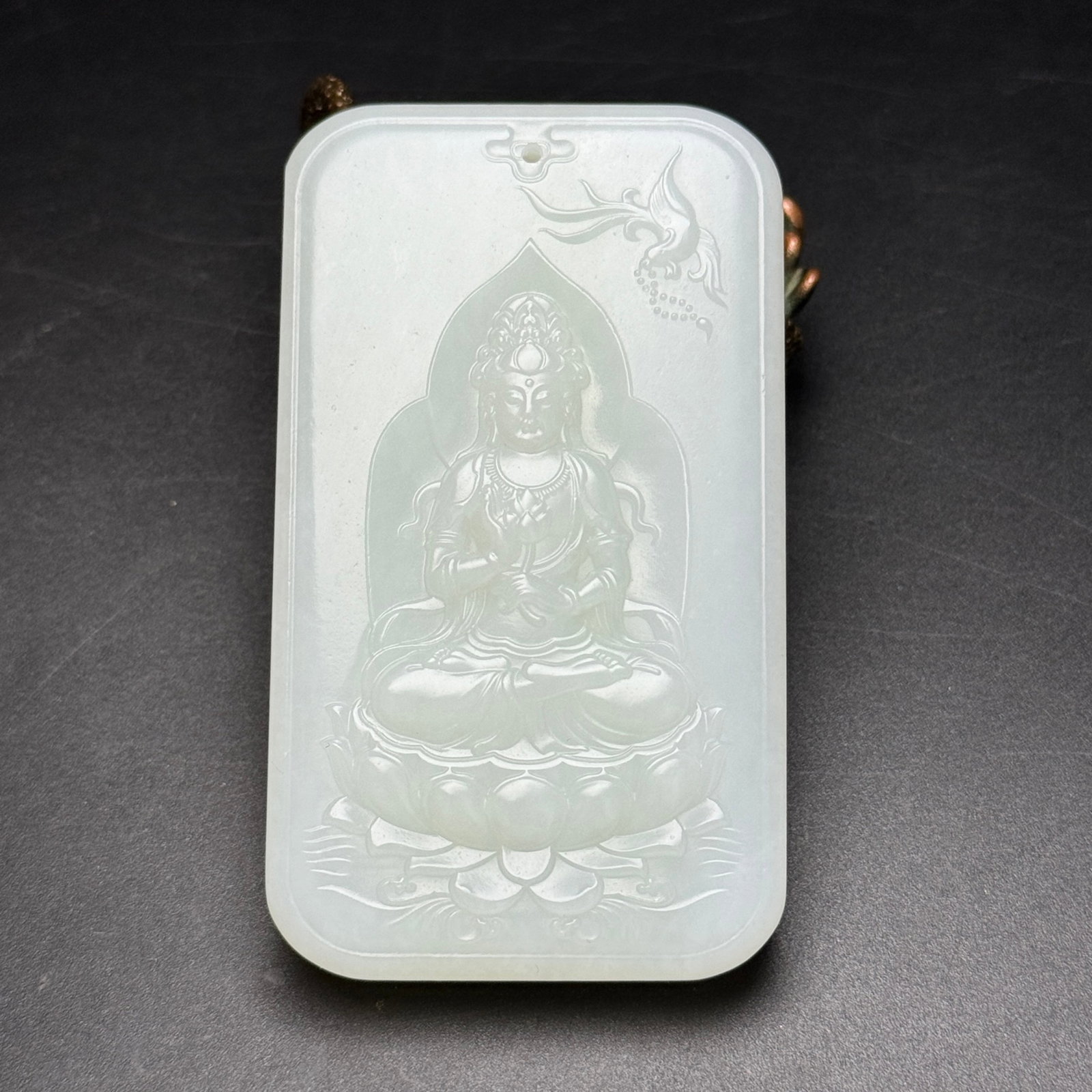 An Exquisite White Jade Statue of Avalokitesvara Pendant: An Exquisite White Jade Statue of Avalokitesvara Pendant,Qing Dynasty,China,Size:3.2inx1.9inx0.6in,Weight:127g 白玉观音像牌,中国清代