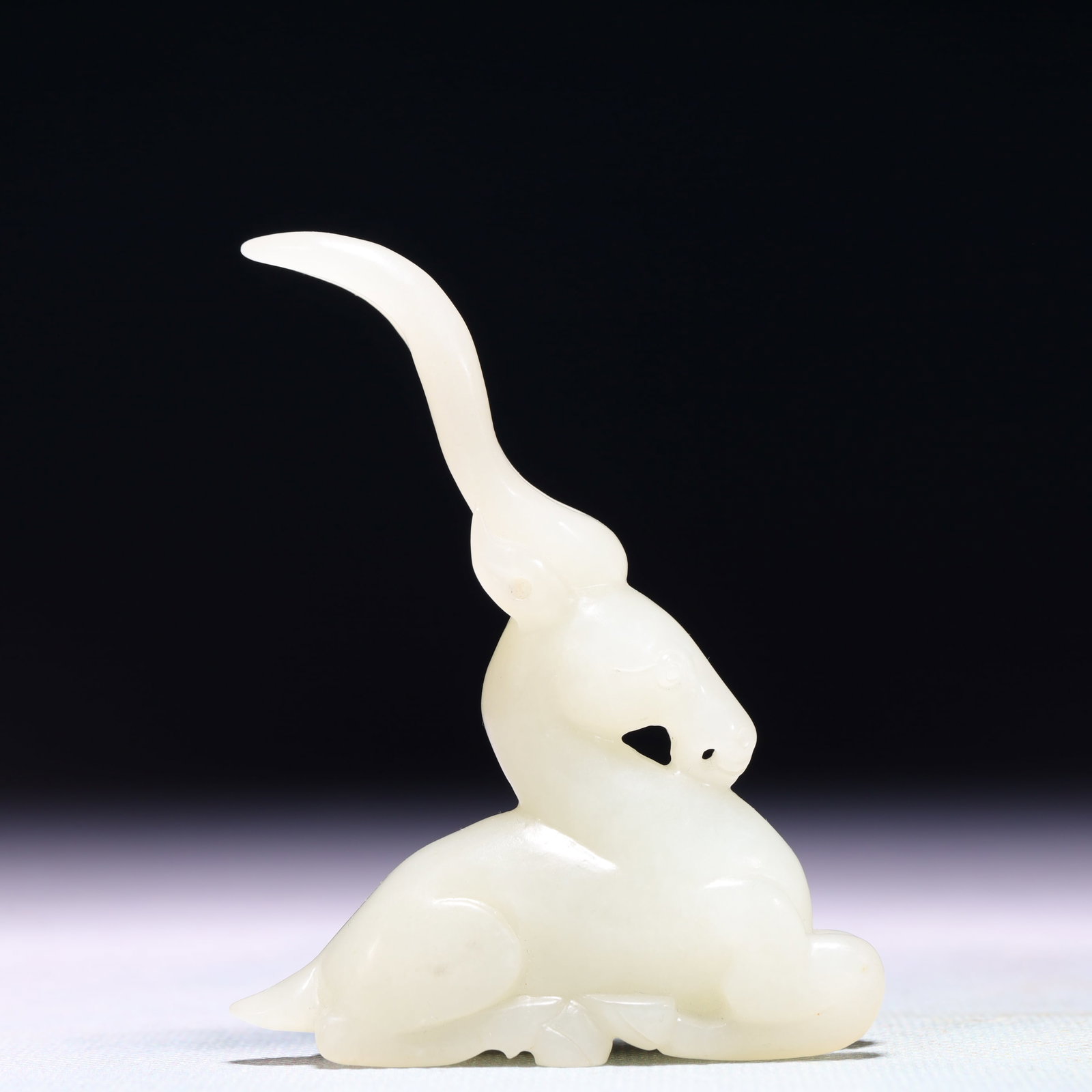 An Exquisite White Jade Deer Ornament: An Exquisite White Jade Deer Ornament,Qing Dynasty,China,Size:2.4inx0.8inx3.1in,Weight:71.1g 白玉鹿摆件,中国清代
