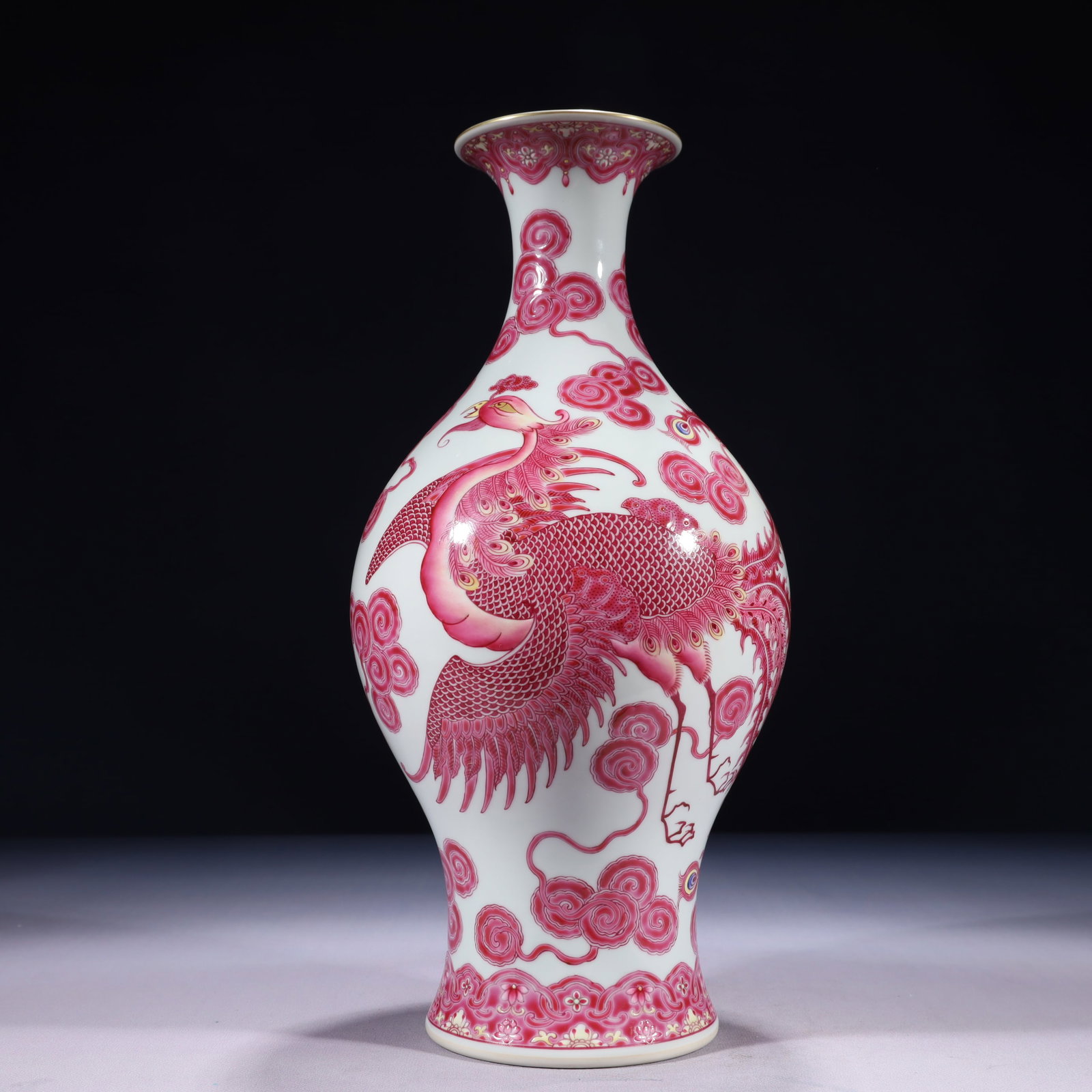 An Exquisite Ruby Red-Glazed Painted Gold Auspicious Cloud and Phoenix Pattern Vase: An Exquisite Ruby Red-Glazed Painted Gold Auspicious Cloud and Phoenix Pattern Vase,Qing Dynasty,China,Qianlong Six-character Mark,Size:5.9inx13.8in,Weight:1750g