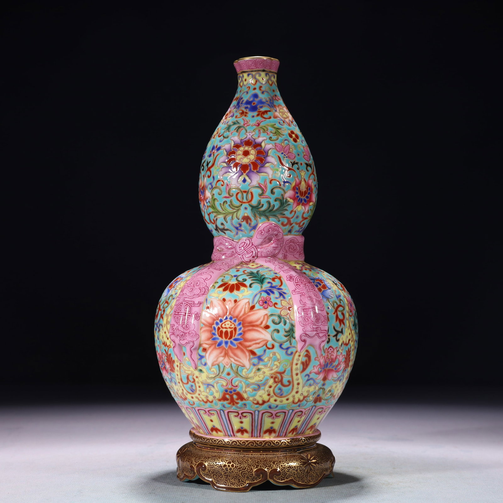 An Exquisite Turquoise Glazed Famille-Rose Painted Gold Lotus Pattern Gourd-Shaped Vase: An Exquisite Turquoise Glazed Famille-Rose Painted Gold Lotus Pattern Gourd-Shaped Vase,Qing Dynasty,China,Yongzheng Six-character Mark,Size:4.3inx9.8in,Weight:900g