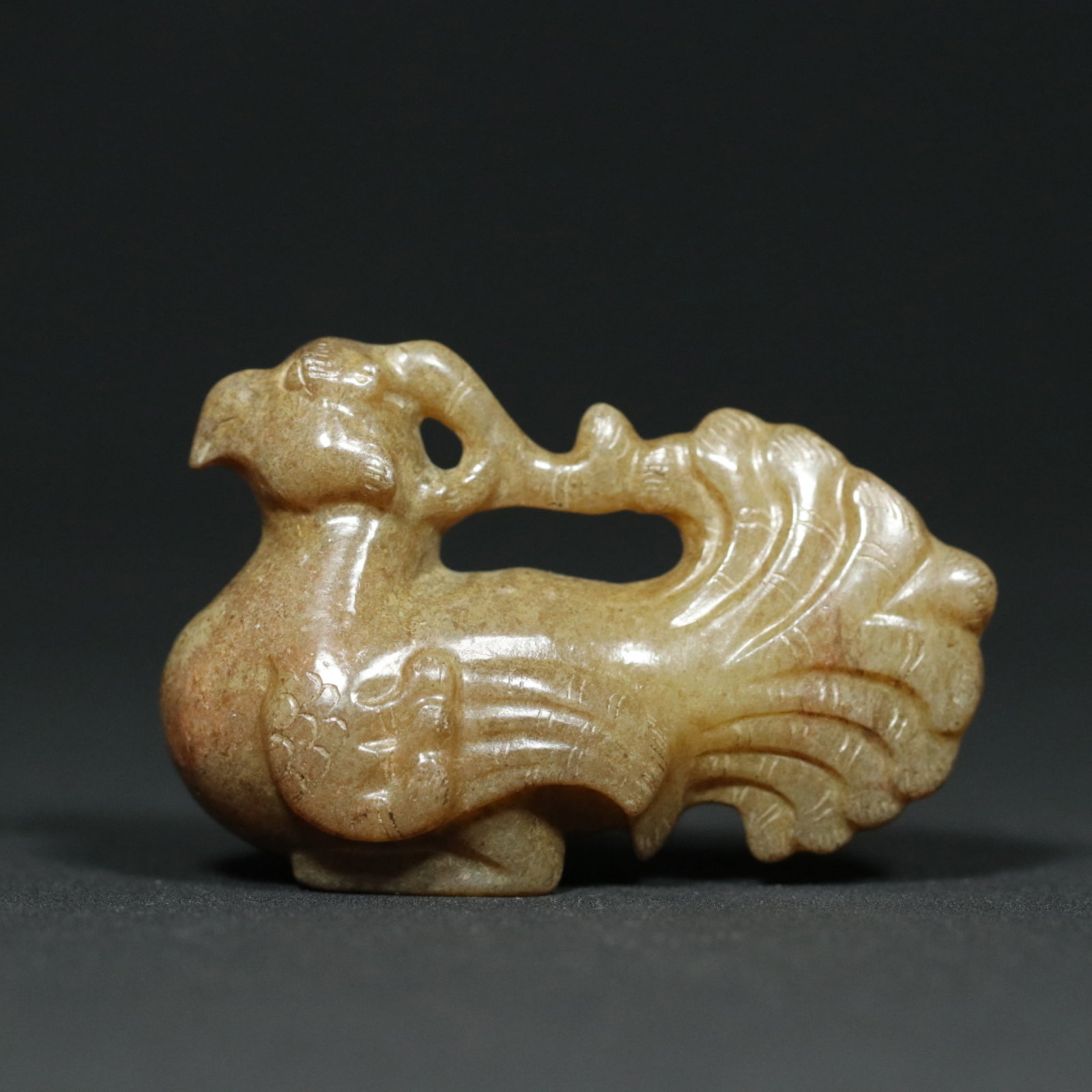 An Exquisite White Jade Phoenix Pendant: An Exquisite White Jade Phoenix Pendant,Han Dynasty,China,Size:2.3inx1inx1.5in,Weight:50.5g 白玉凤凰挂件,中国汉代