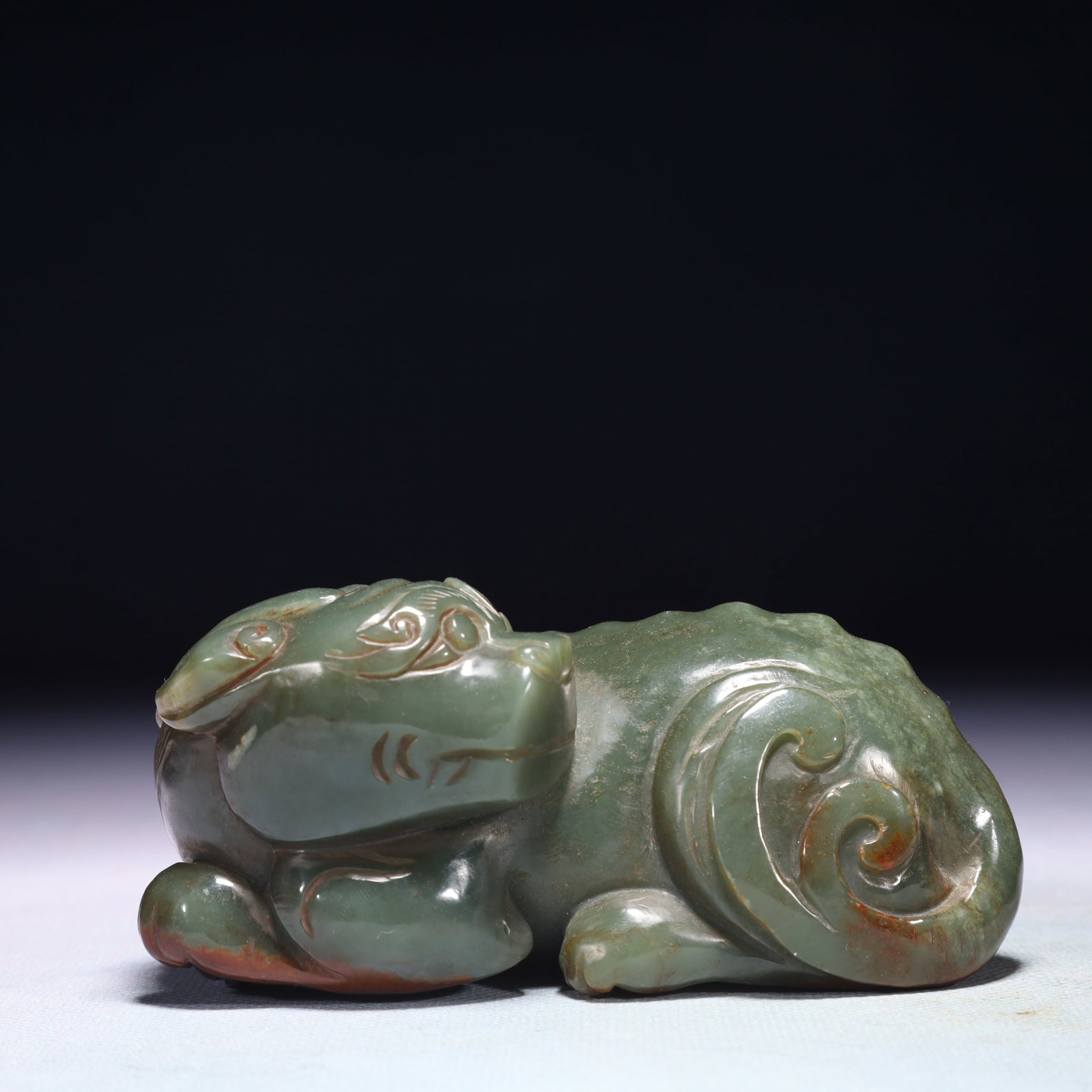 An Exquisite Jasper Unicorn Ornament: An Exquisite Jasper Unicorn Ornament,Qing Dynasty,China,Size:4.3inx2inx2in,Weight:598g 碧玉独角兽摆件,中国清代
