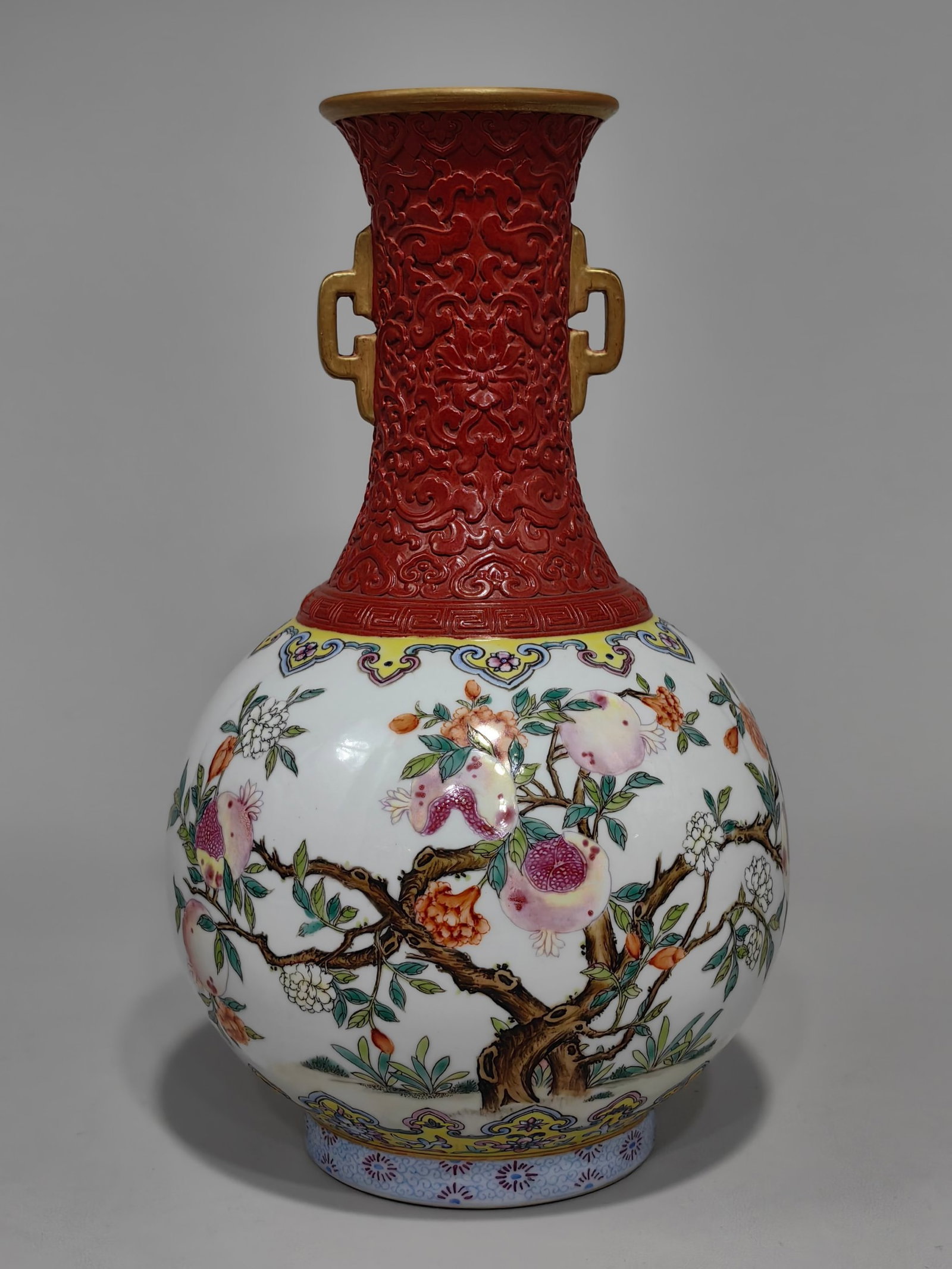 An Exquisite Red Ground Famille-Rose Painted Gold Flower and Fruit Pattern Double-Ears Vase (1 of 7)