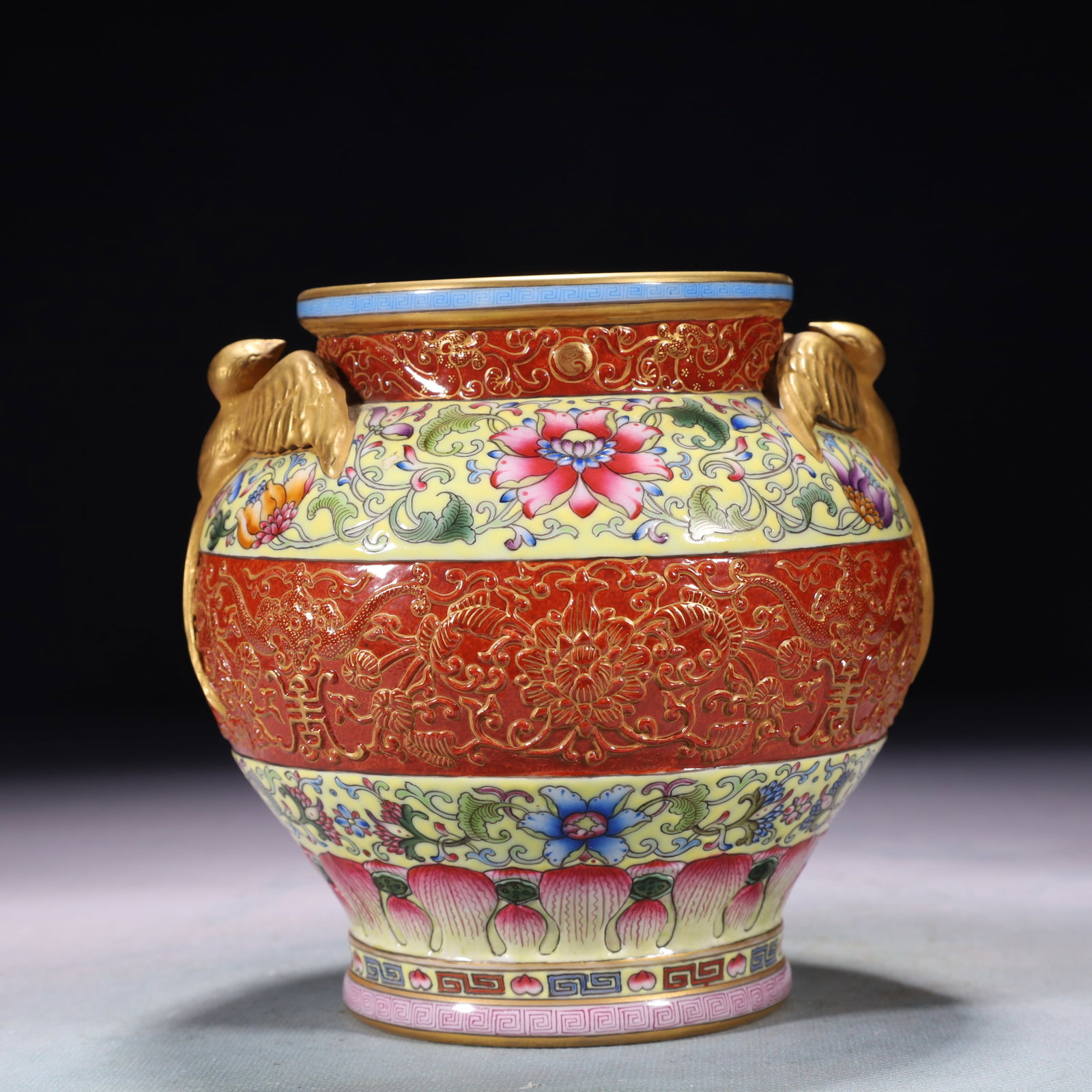 An Exquisite Yellow Ground Famille-Rose Lotus Pattern Beast-Ears Jar: An Exquisite Yellow Ground Famille-Rose Lotus Pattern Beast-Ears Jar,Qing Dynasty,China,Qianlong Six-character Mark,Size:5.1inx9.8in,Weight:750g 黄地粉彩缠枝莲