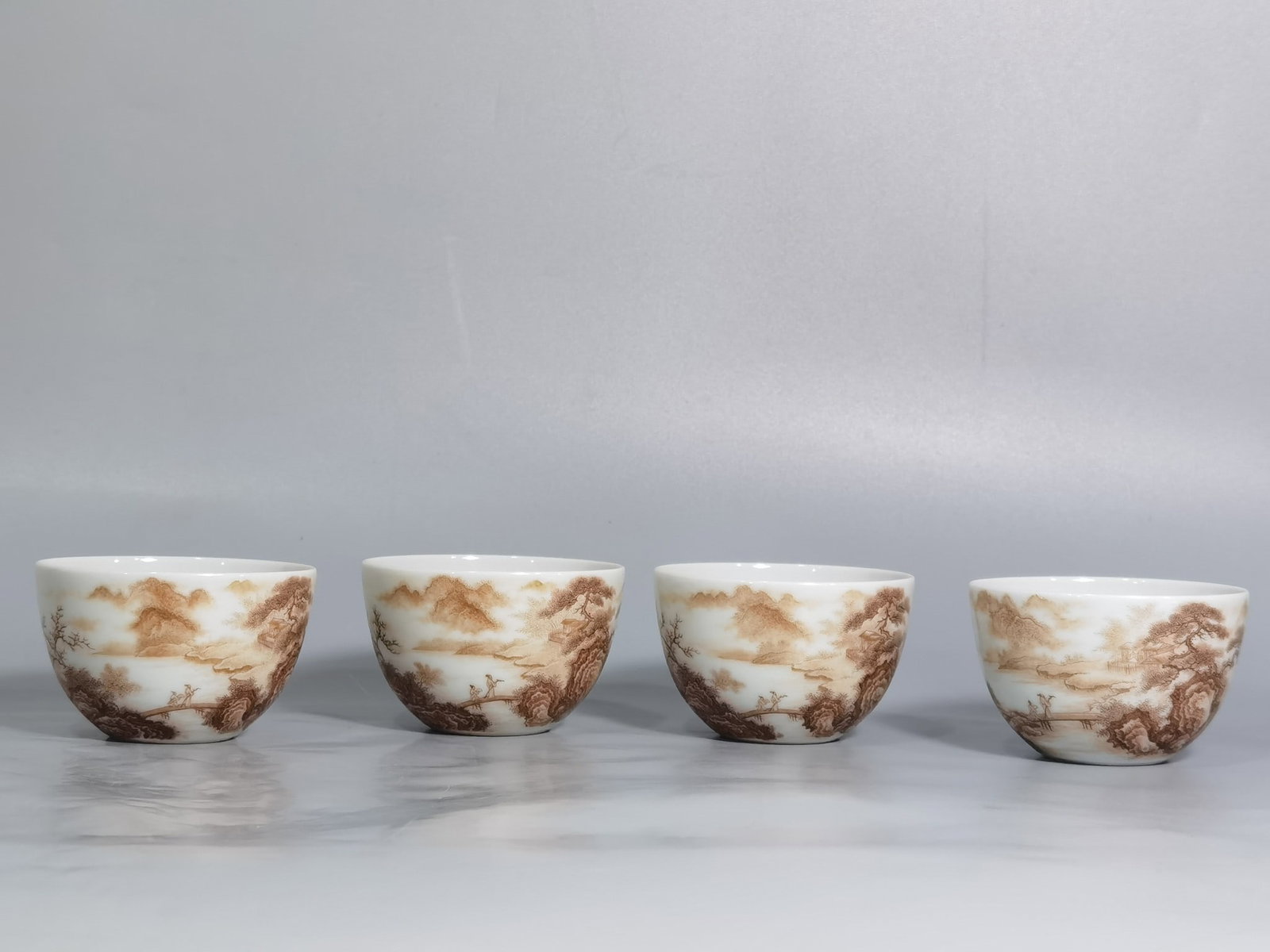 A Set of Fine Ink Color Landscape and Figure Pattern Cups: A Set of Fine Ink Color Landscape and Figure Pattern Cups,Qing Dynasty,China,Qianlong Six-character Mark,Size:2.5inx1.6in 一套墨彩山水人物纹੗