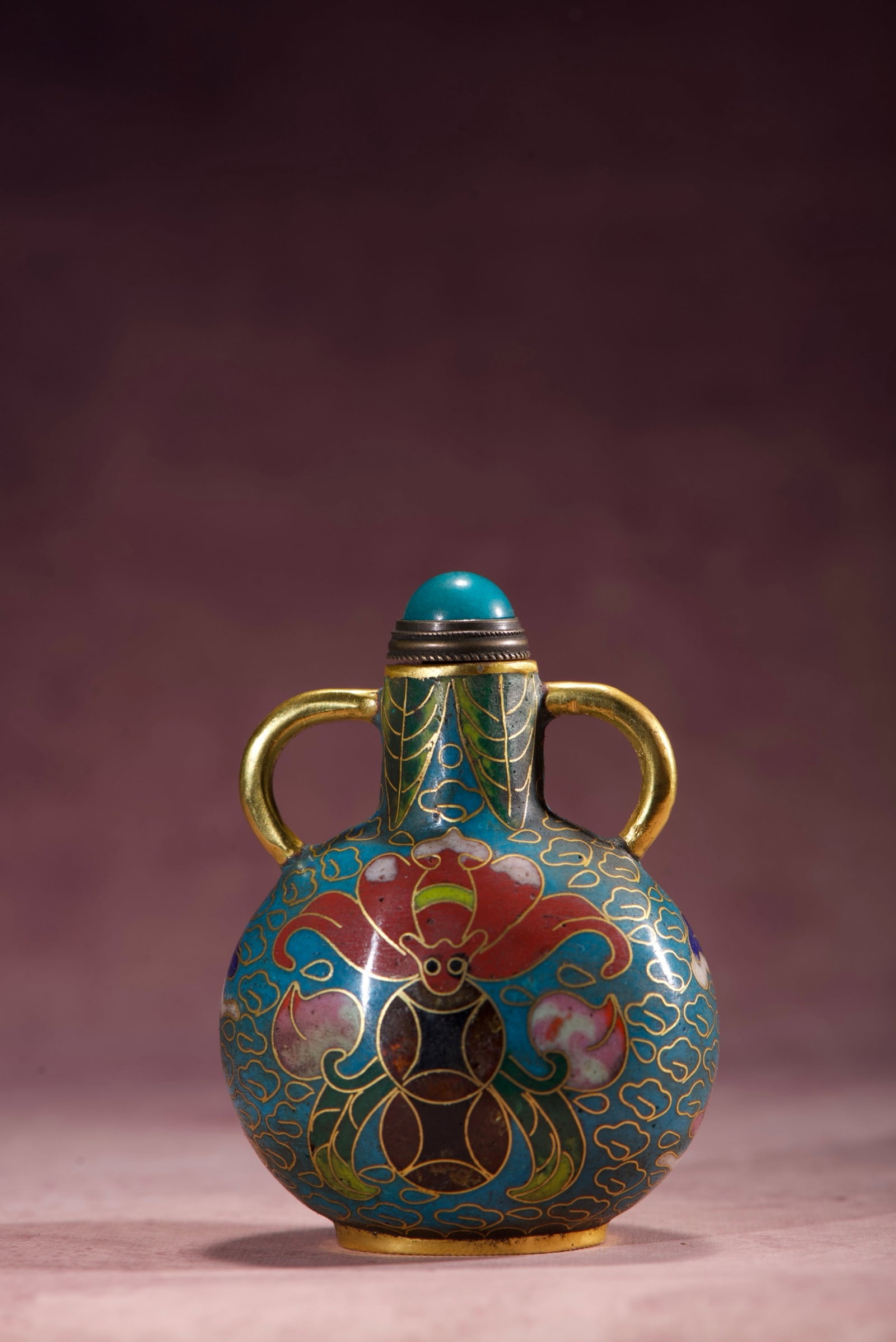 An Exquisite Cloisonne Bats and Peach Pattern Double-Ears Snuff Bottle: An Exquisite Cloisonne Bats and Peach Pattern Double-Ears Snuff Bottle,Qing Dynasty,China,Qianlong Four-character Mark,Size:2.9inx2.2inx1.6in,Weight:75g 景泰蓝福寿纹