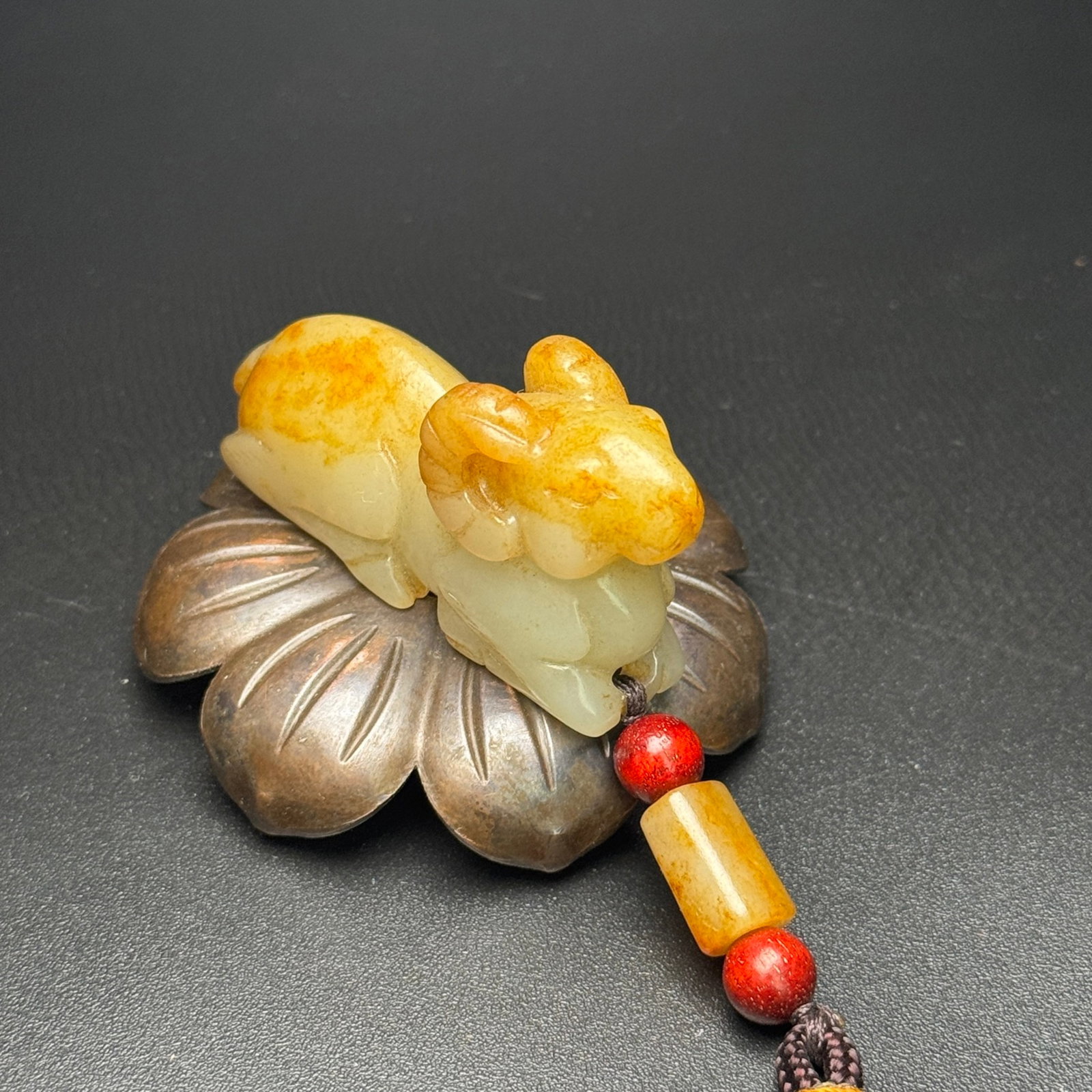 An Exquisite White Jade Sheep Pendant: An Exquisite White Jade Sheep Pendant,Qing Dynasty,China,Size:2.3inx1.2inx0.7in,Weight:49g 白玉羊挂件,中国清代