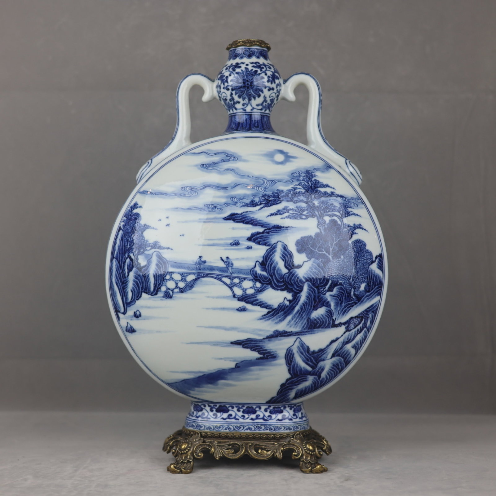 A Huge Blue and White Inlaid Bronze Landscape and Figure Pattern Double-Ears Vase: A Huge Blue and White Inlaid Bronze Landscape and Figure Pattern Double-Ears Vase,Qing Dynasty,China,Qianlong Six-character Mark,Size:18.5inx11.8in 青花镶铜山水
