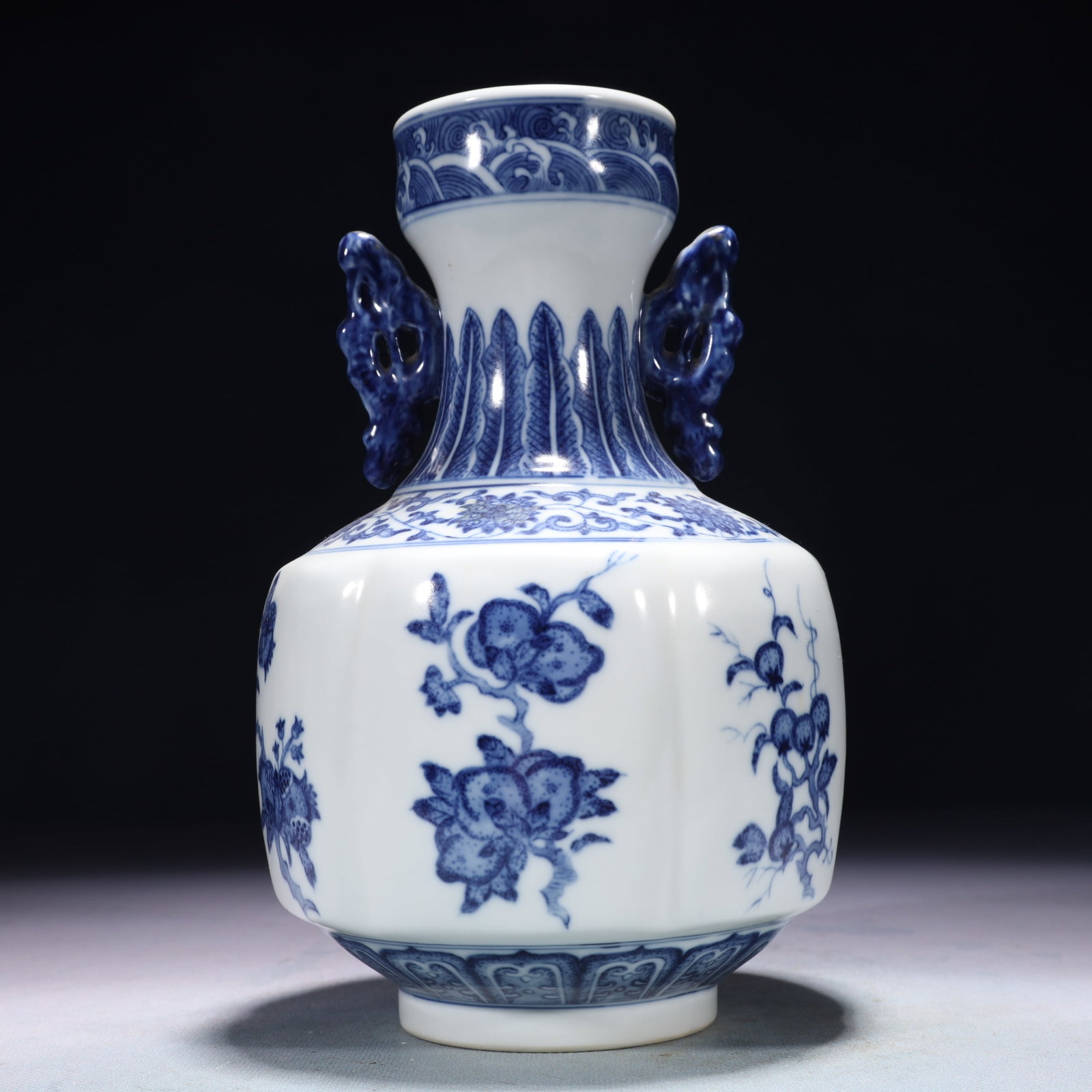 An Exquisite Blue and White Flower and Fruit Pattern Double-Ears Vase: An Exquisite Blue and White Flower and Fruit Pattern Double-Ears Vase,Qing Dynasty,China,Qianlong Six-character Mark,Size:5.1inx8.7in,Weight:1200g 青花花果纹双ň