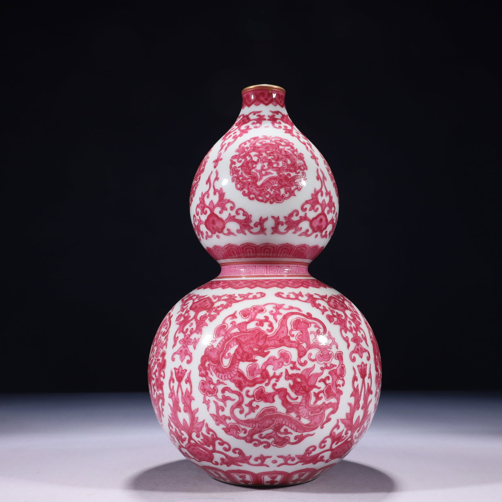 An Exquisite Ruby Red-Glazed Painted Gold Lotus and Dragon Pattern Gourd-Shaped Vase: An Exquisite Ruby Red-Glazed Painted Gold Lotus and Dragon Pattern Gourd-Shaped Vase 胭脂红描金缠枝莲龙纹葫芦瓶,中&#