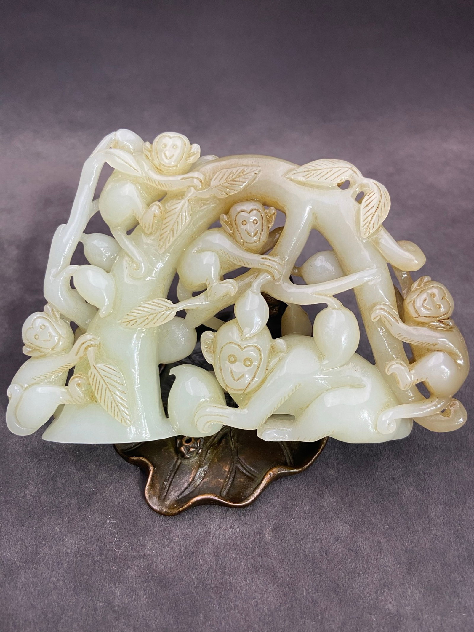 An Exquisite White Jade Monkey and Peach Pattern Ornament (1 of 6)