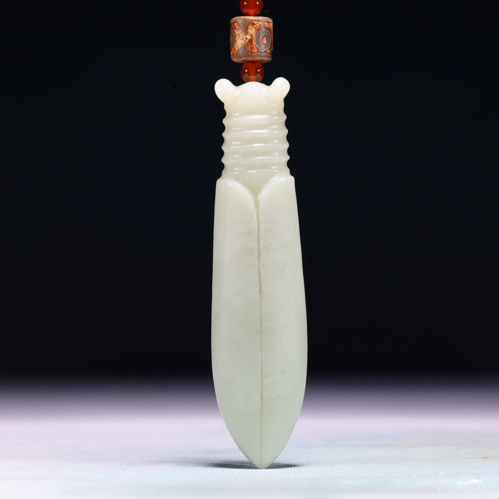 An Exquisite White Jade Cicada Pendant: An Exquisite White Jade Cicada Pendant,Qing Dynasty,China,Size:1.2inx0.8inx5.1in,Weight:176g 白玉蝉挂件,中国清代