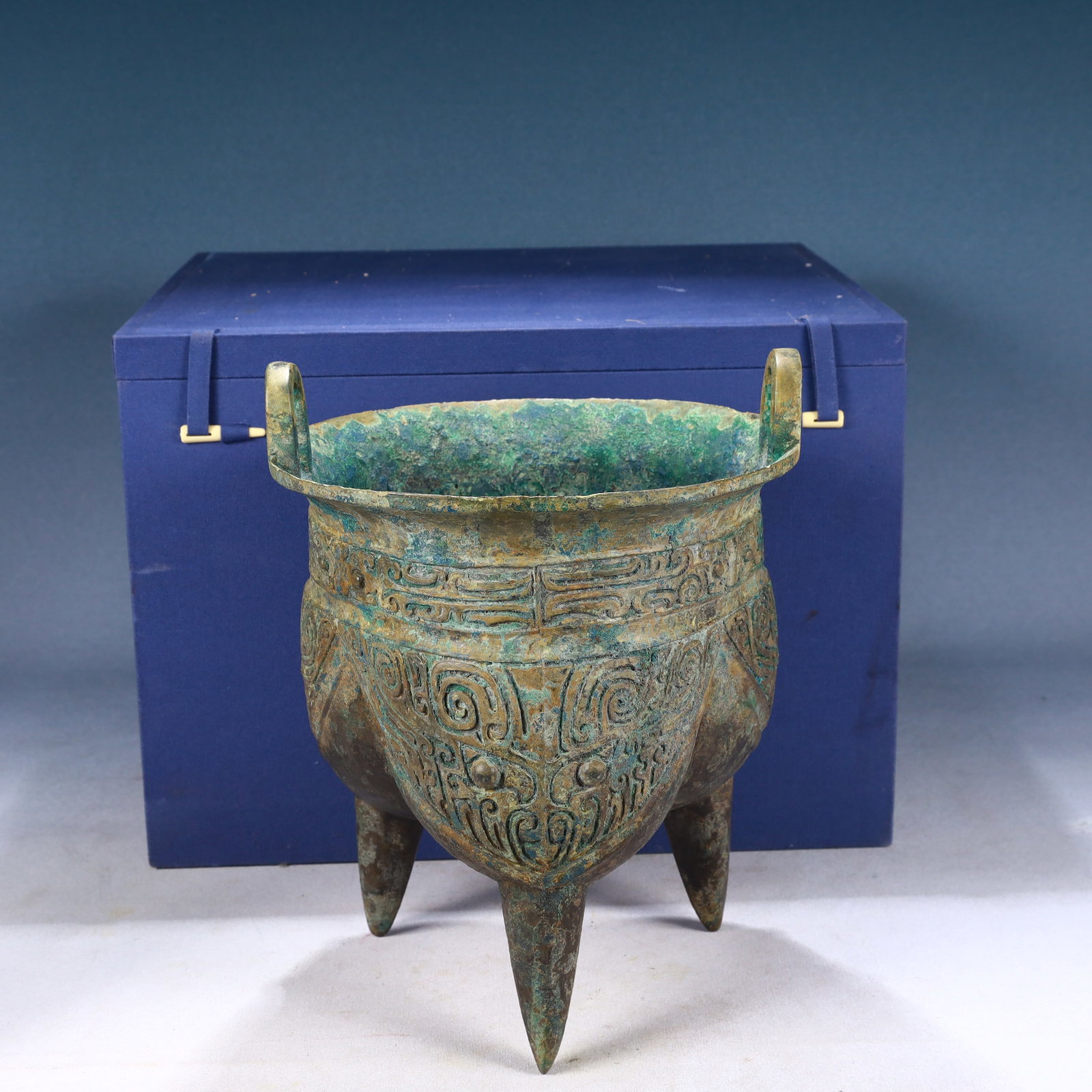 An Archaic Bronze Beast-Face Pattern Double-Ears and Tripod Censer: An Archaic Bronze Beast-Face Pattern Double-Ears and Tripod Censer,Qing Dynasty, China,Size:8.7inx11in,Weight:3150g
