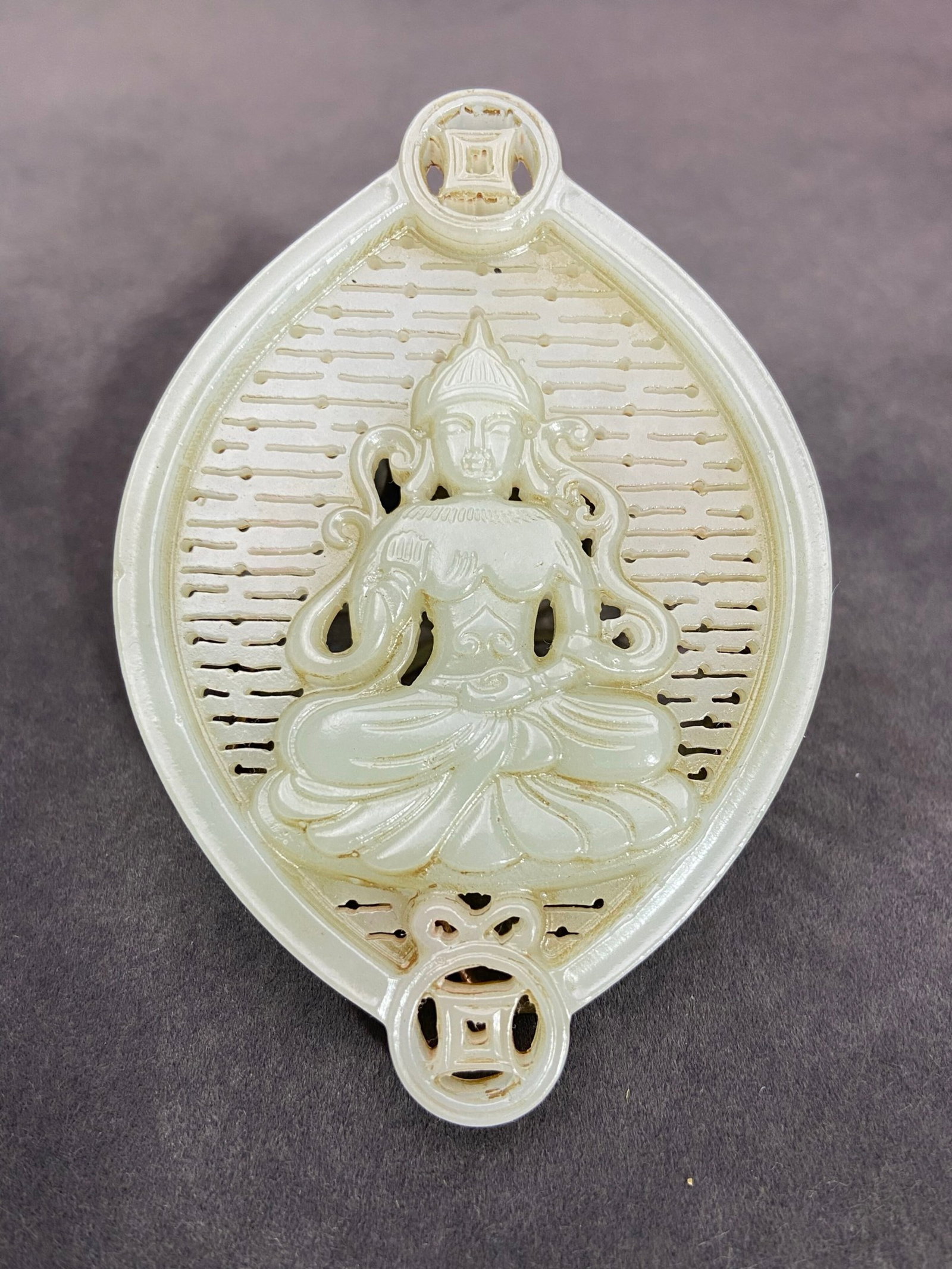An Exquisite White Jade Hollow Buddha Statue Pendant: An Exquisite White Jade Hollow Buddha Statue Pendant,Qing Dynasty,China,Size:3.4inx2.4inx0.2in,Weight:39g 白玉镂空佛像挂件,中国清É