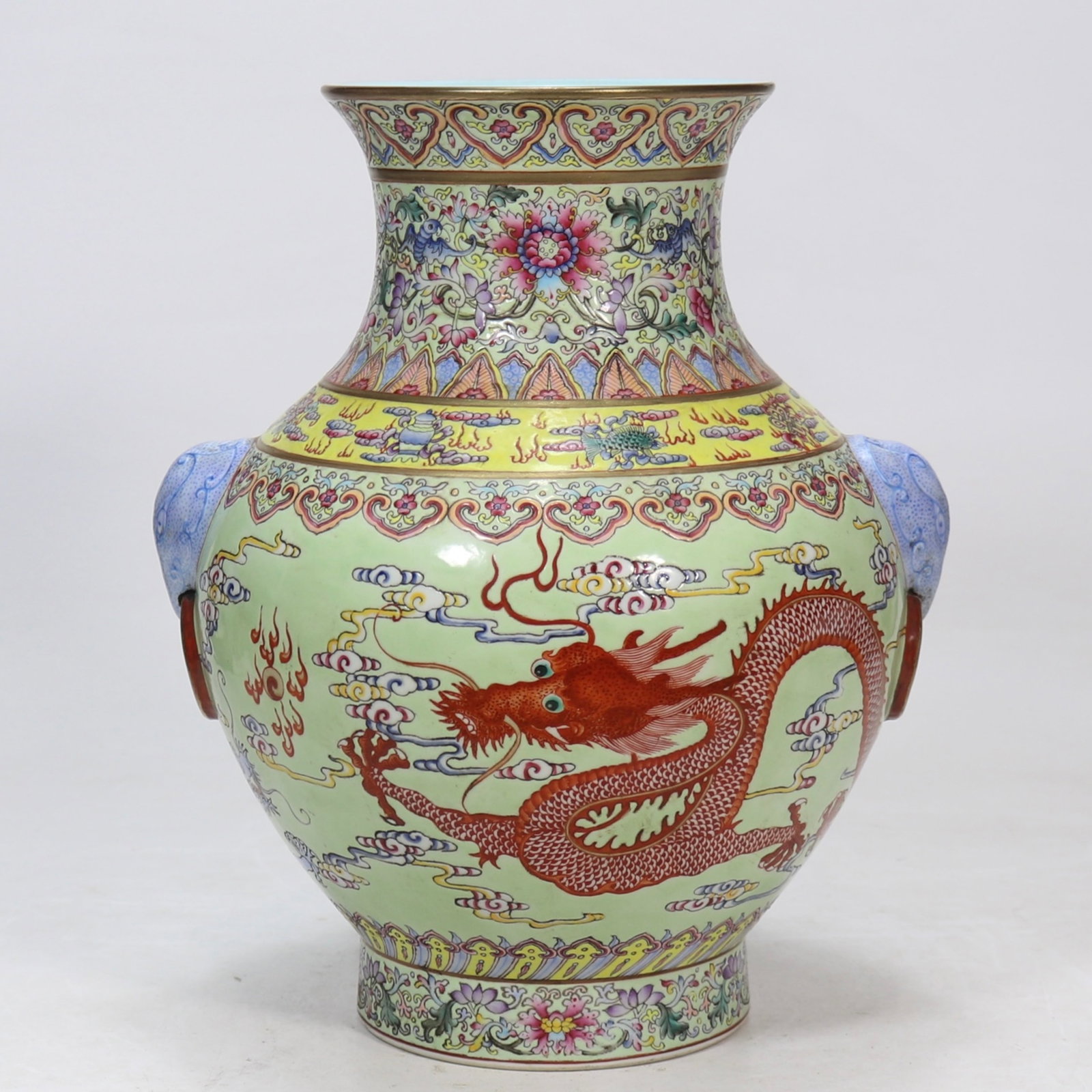 An Exquisite Iron-Red Auspicious Cloud and Dragon Pattern Beast-Ears Vase: An Exquisite Iron-Red Auspicious Cloud and Dragon Pattern Beast-Ears Vase,Qing Dynasty,China,Qianlong Six-character Mark,Size:11.3inx5.3in 矾红祥云龙纹兽ň