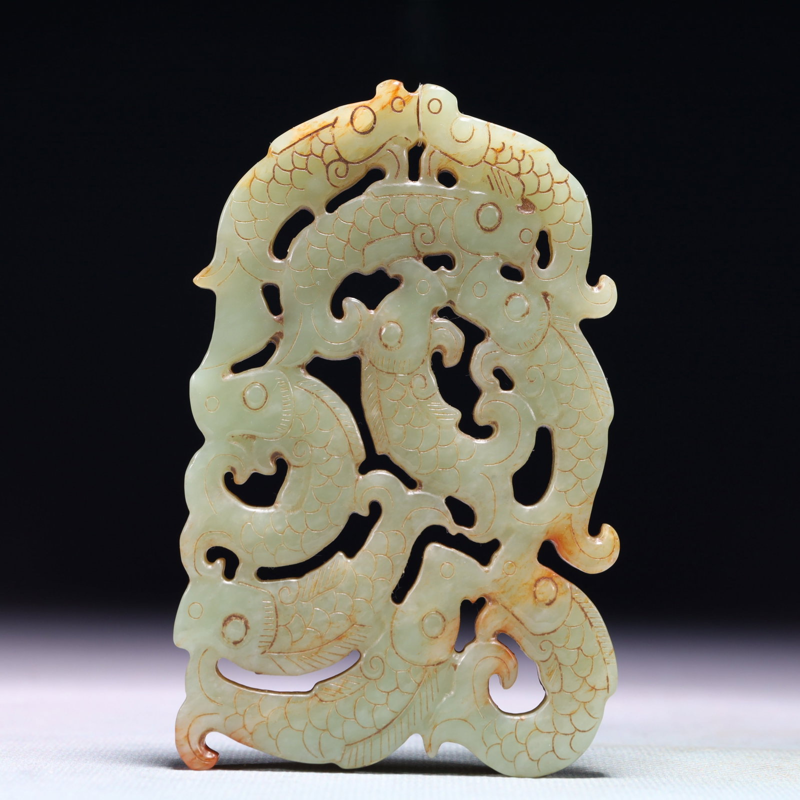 An Exquisite White Jade Fish Pattern Pendant: An Exquisite White Jade Fish Pattern Pendant,Qing Dynasty,China,Size:2.8inx4.3in,Weight:126.6g 白玉鱼纹挂件,中国清代