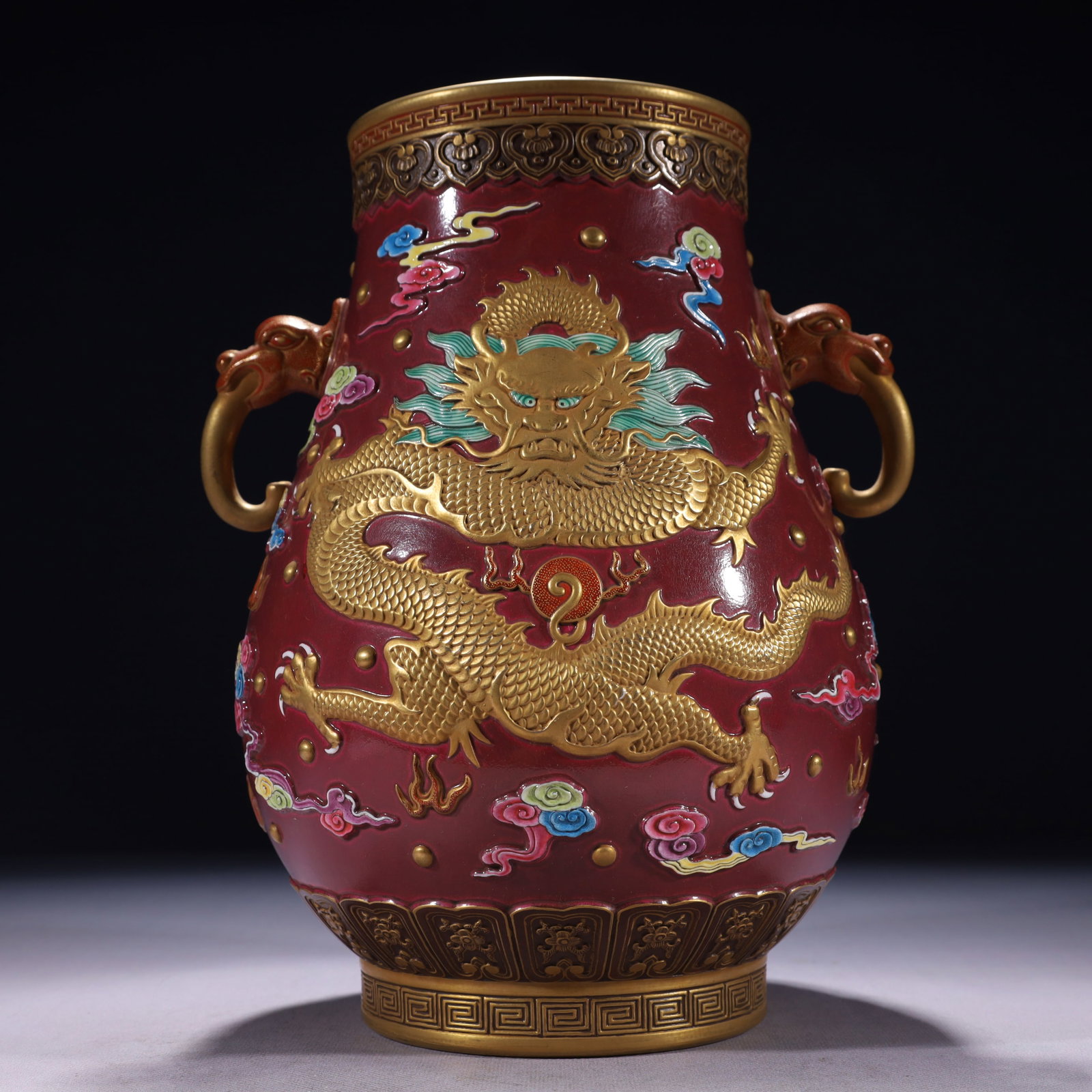 An Exquisite Purple Glazed Gold Ground Auspicious Cloud and Dragon Pattern Double-Ears Vase: An Exquisite Purple Glazed Gold Ground Auspicious Cloud and Dragon Pattern Double-Ears Vase,Qing Dynasty,China,Qianlong Six-character Mark,Size:8.3inx7.1inx11.2in,Weight:2400g 紫釉金