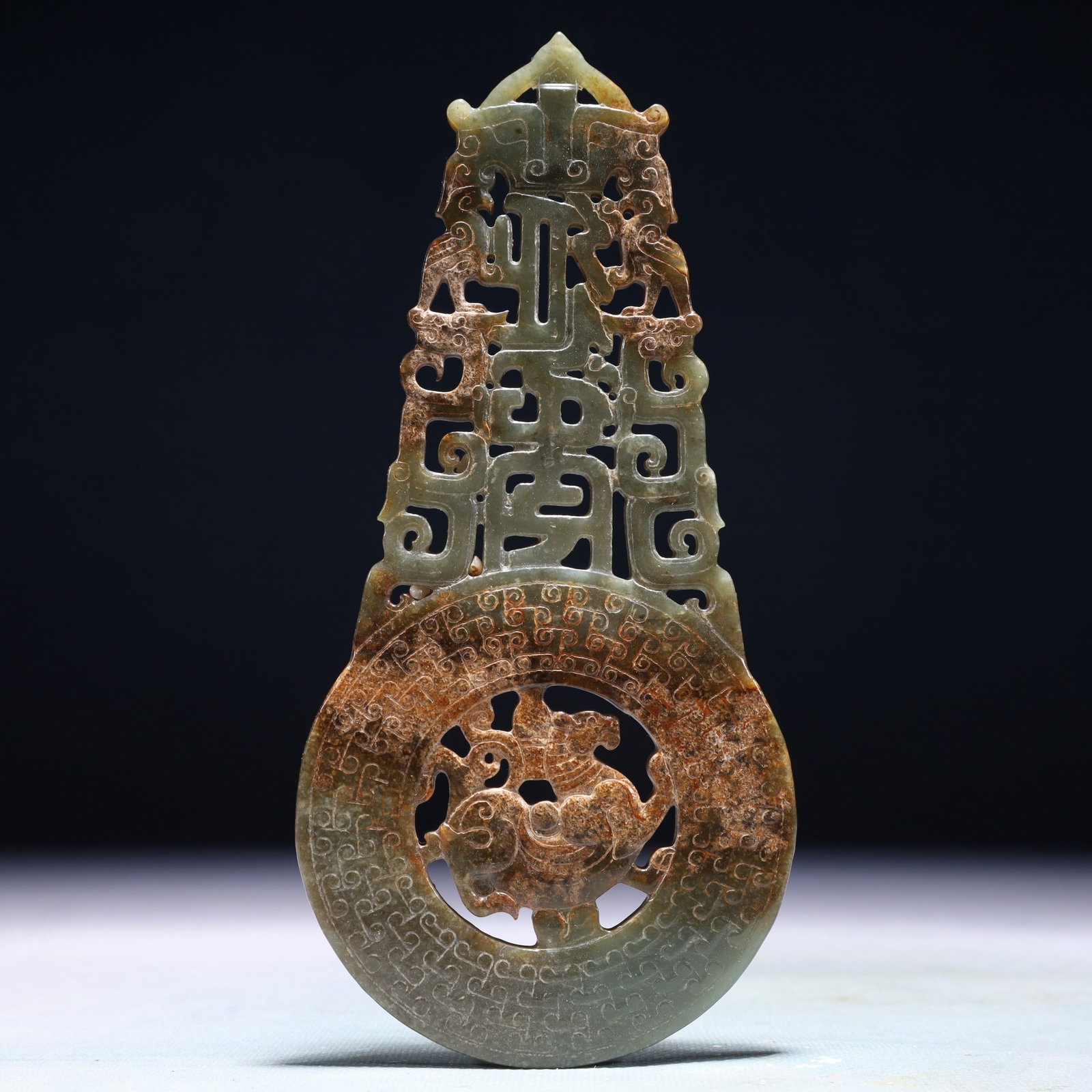 An Exquisite Green Jade Beast Pattern Pendant (1 of 6)