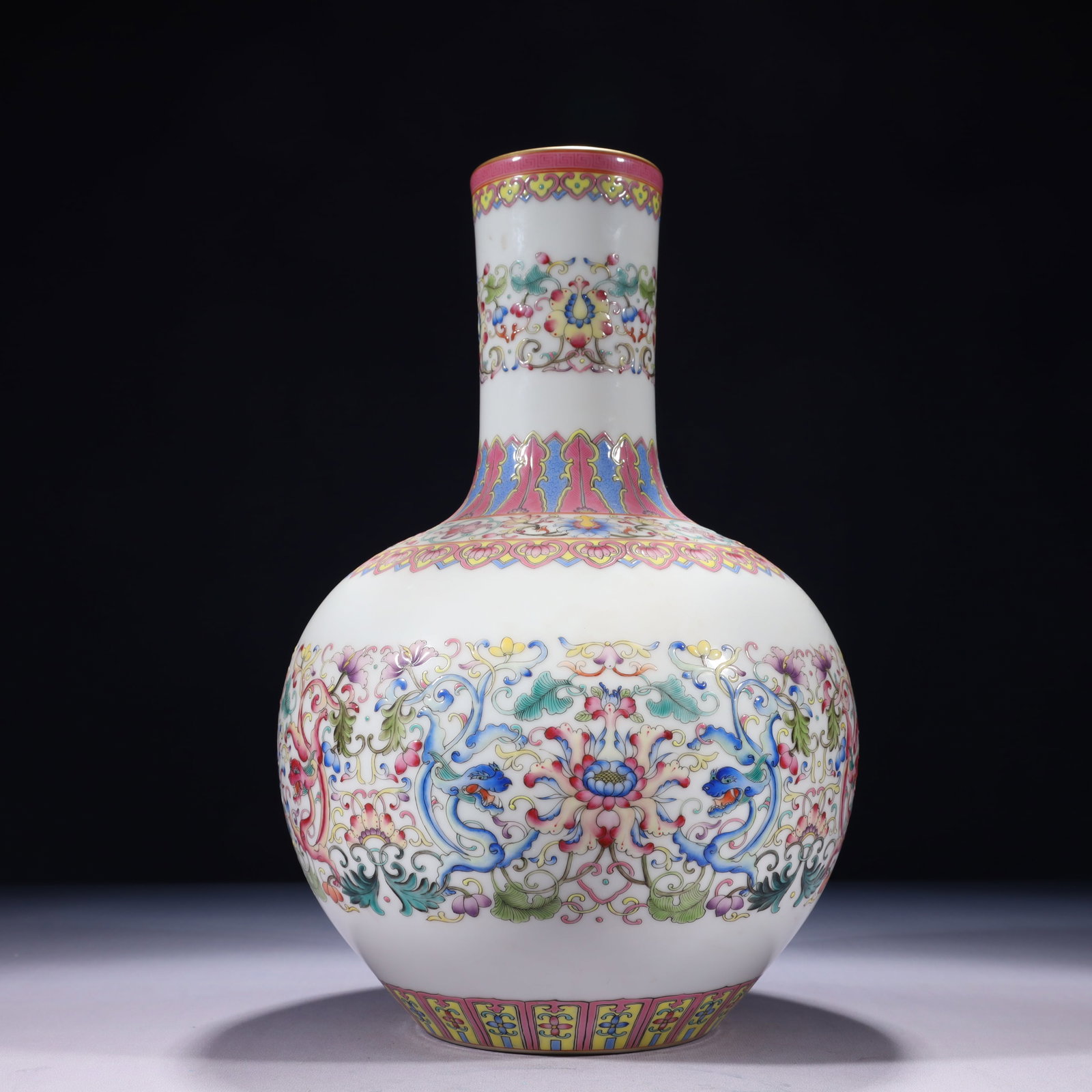 An Exquisite Famille-Rose Painted Gold Lotus Pattern Vase: An Exquisite Famille-Rose Painted Gold Lotus Pattern Vase 粉彩描金缠枝莲纹瓶,中国清代,乾隆六字