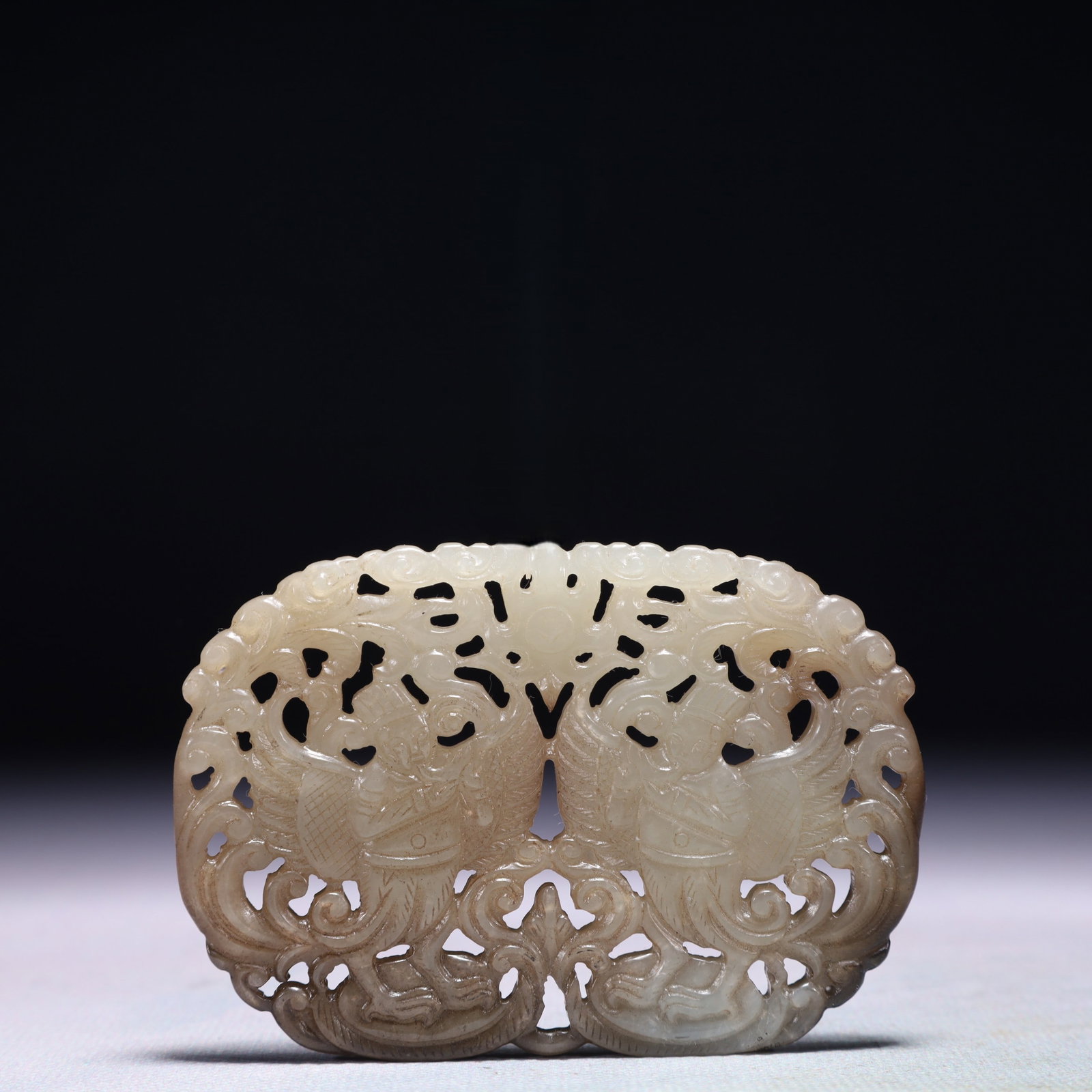 An Exquisite White Jade Figure Pattern Pendant: An Exquisite White Jade Figure Pattern Pendant,Qing Dynasty,China,Size:3inx2.2in,Weight:41.1g 白玉人物纹佩,中国清代