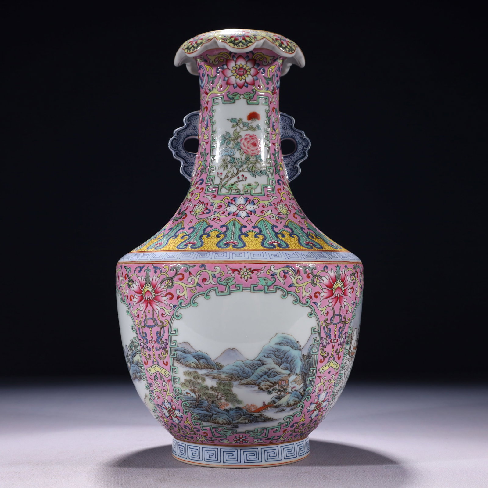 An Exquisite Pink Ground Enamel Painted Gold Landscape Pattern Double-Ears Vase: An Exquisite Pink Ground Enamel Painted Gold Landscape Pattern Double-Ears Vase,Qing Dynasty,China,Qianlong Six-character Mark,Size:6.7inx13in,Weight:1850g 粉地珐琅彩