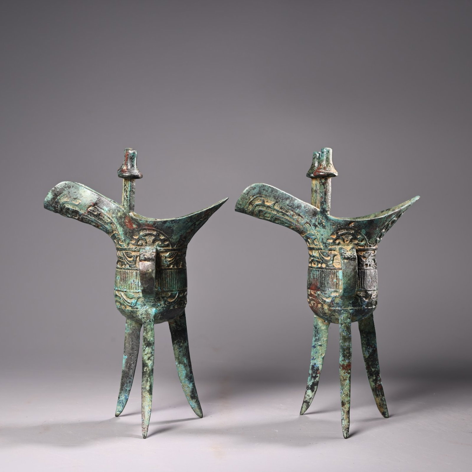 A Pair of Exquisite Bronze Tripod Libation Cups (1 of 12)
