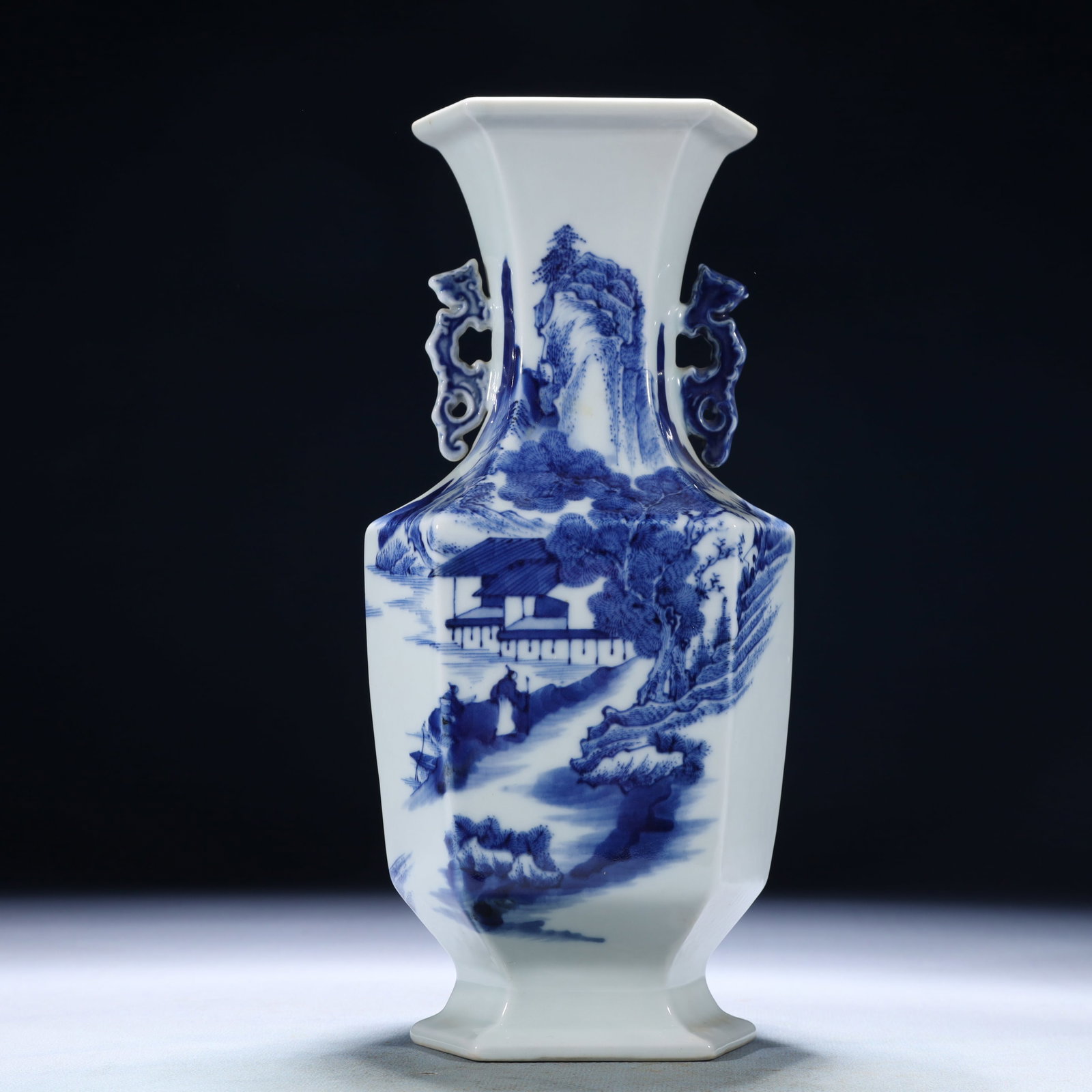 An Exquisite Blue and White Landscape and Figure Pattern Double-Ears Vase: An Exquisite Blue and White Landscape and Figure Pattern Double-Ears Vase,Qing Dynasty,China,Qianlong Six-character Mark,Size:4.7inx3.5inx9.4in,Weight:1000g 青花山水人