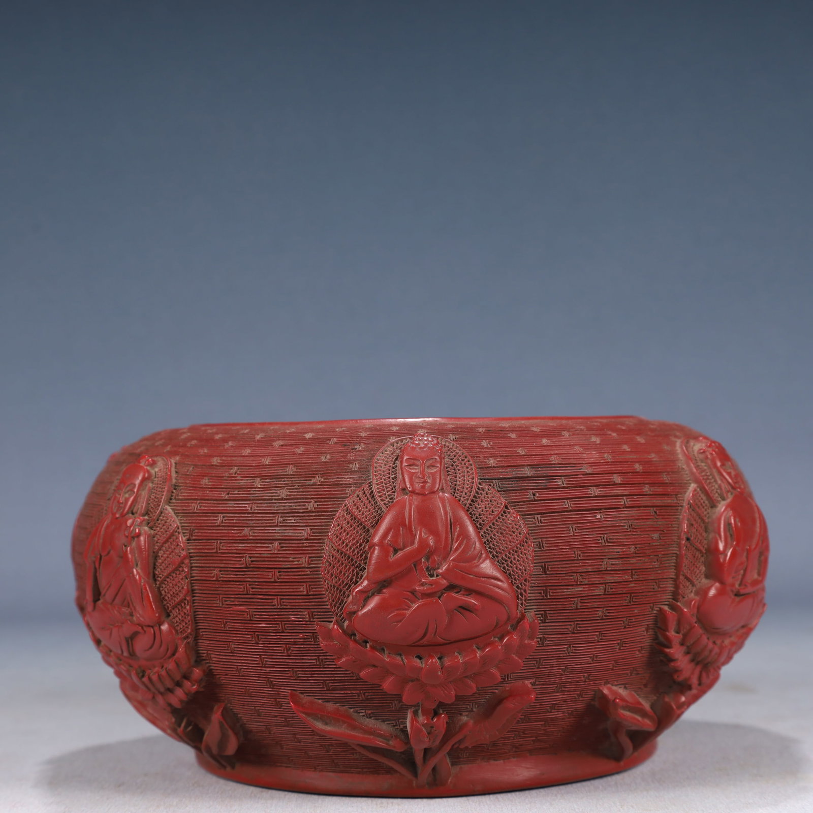 An Exquisite Carved Red Lacquer Buddha Pattern Water Pot: An Exquisite Carved Red Lacquer Buddha Pattern Water Pot,Qing Dynasty, China,Size:7.9inx3.9in,Weight:900g 剔红漆佛像纹水盂,中国清É