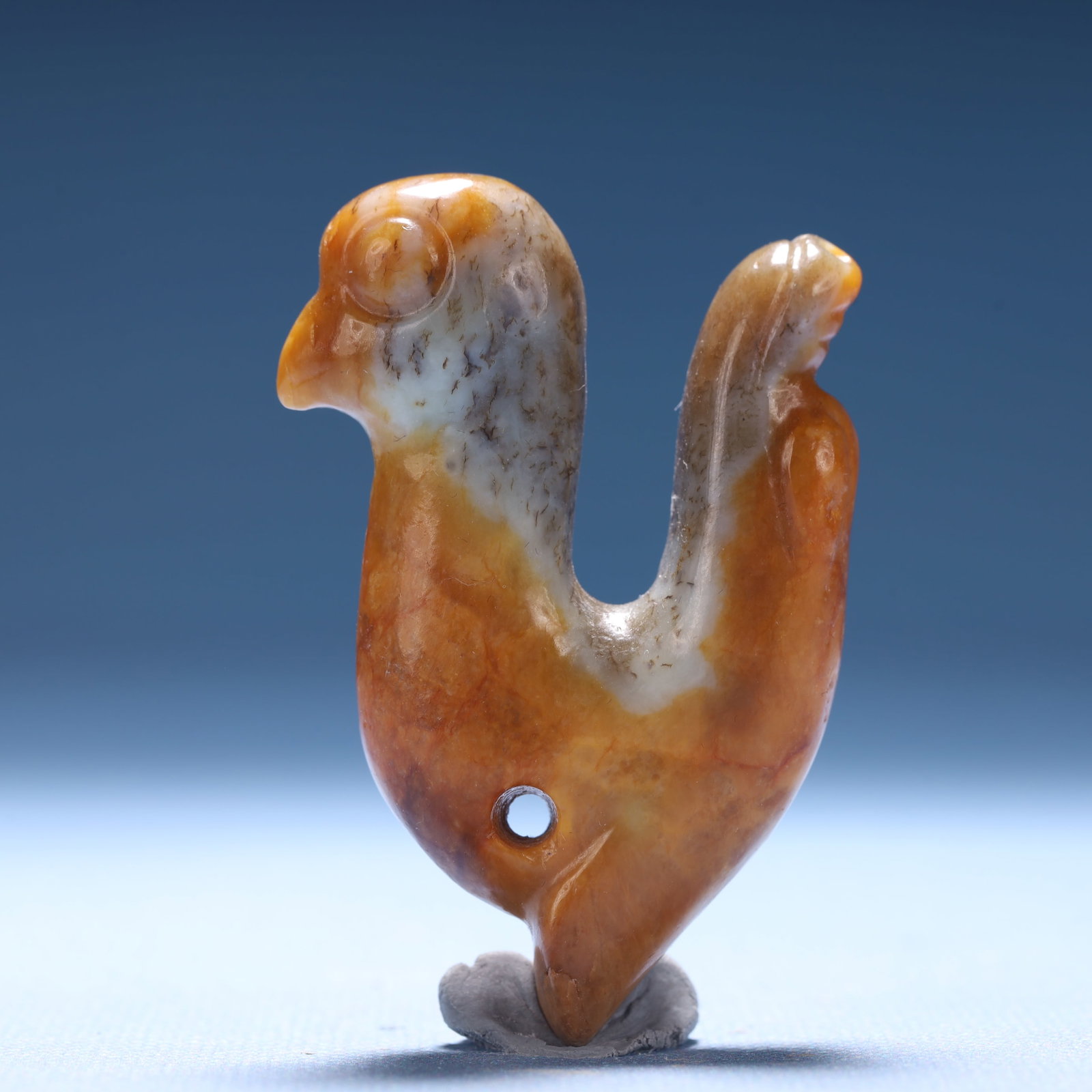 An Archaic Hongshan Culture Yellow Jade Bird Pendant: An Archaic Hongshan Culture Yellow Jade Bird Pendant,Ancient Time,China,Size:1.6inx0.6inx2.4in,Weight:45.8g 红山文化黄玉鸟挂件,中国
