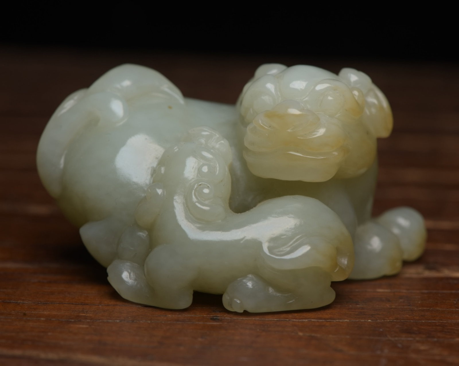 An Exquisite White Jade Beast Ornament (1 of 9)