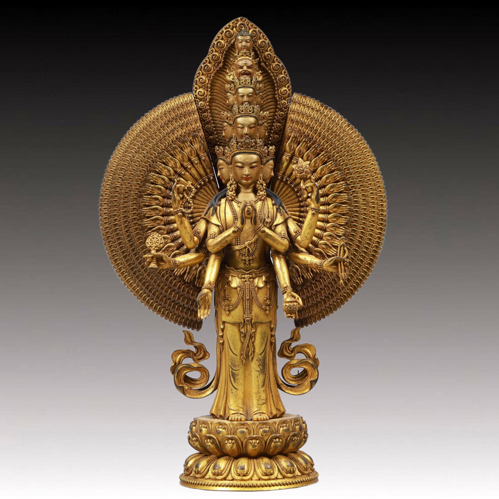 A Solemn Gilt Bronze Statue of Thousand-hand Guanyin: A Solemn Gilt Bronze Statue of Thousand-hand Guanyin, Qing Dynasty, China, Size:5.9inx2.8inx7.9in, Weight:1300g