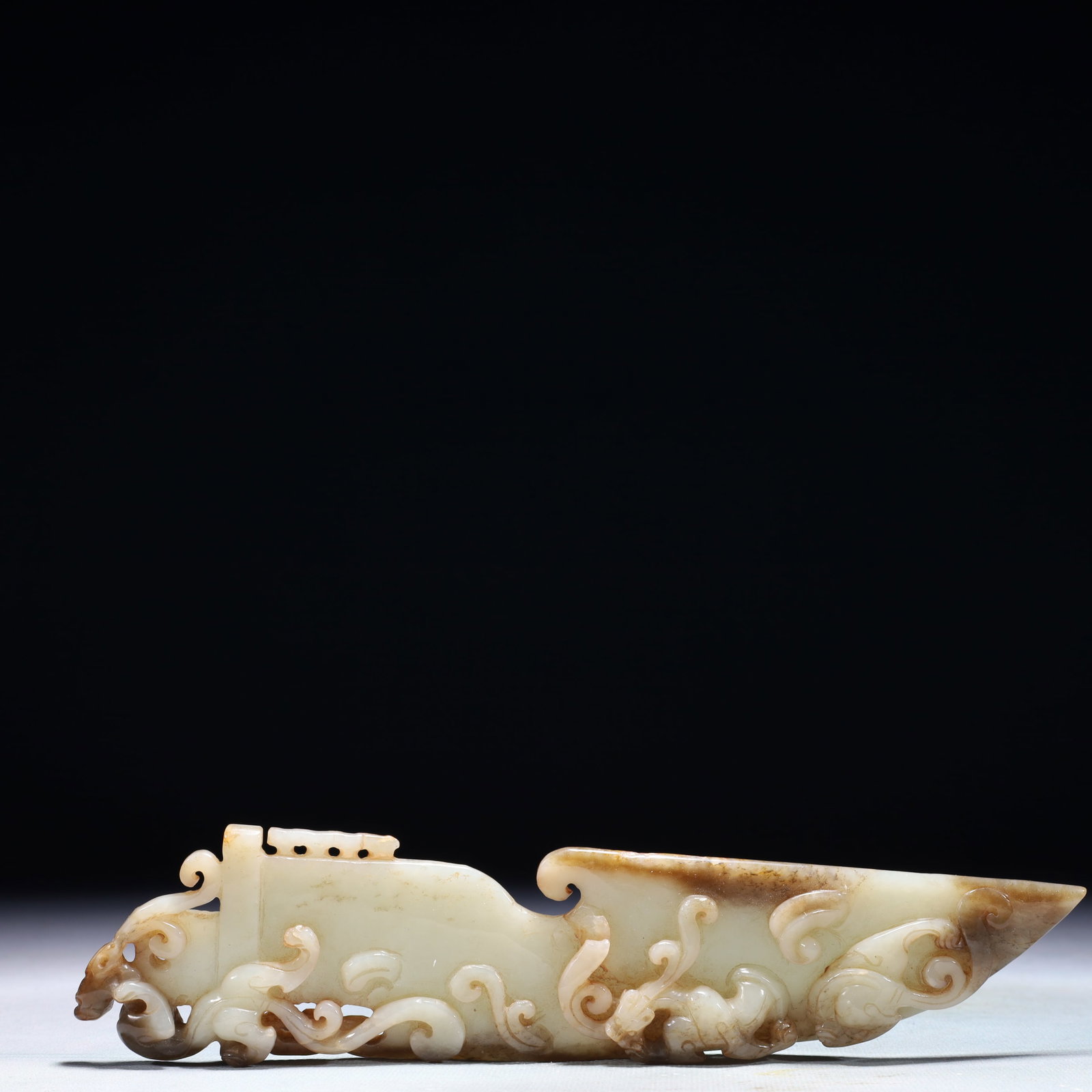 An Exquisite White Jade Beast Pattern Pendant: An Exquisite White Jade Beast Pattern Pendant,Qing Dynasty,China,Size:1.8inx0.6inx9.1in,Weight:183g 白玉兽纹挂件,中国清代