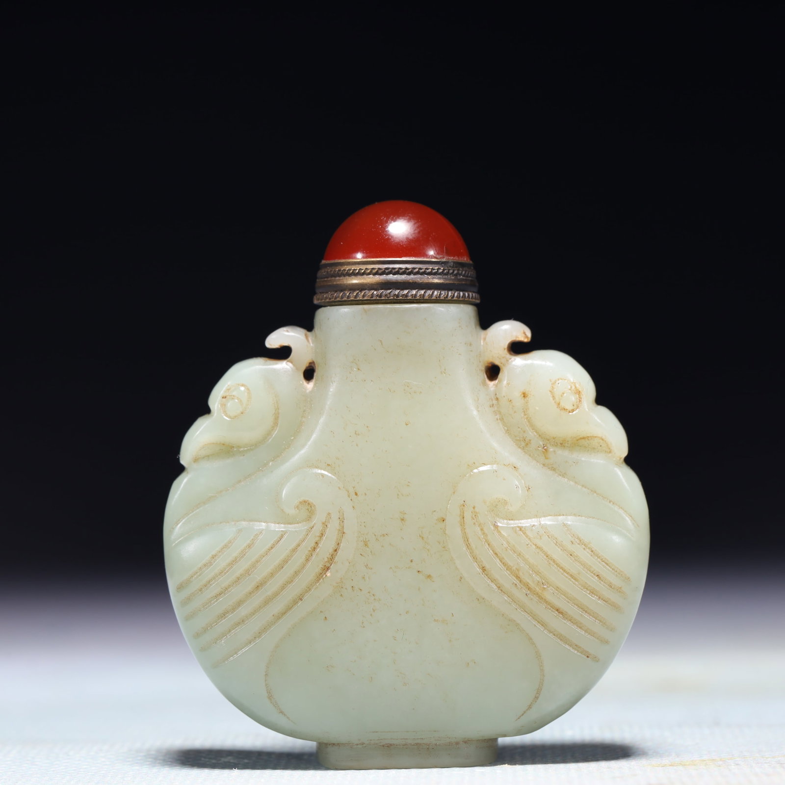 An Exquisite White Jade Crane-Ears Snuff Bottle: An Exquisite White Jade Crane-Ears Snuff Bottle,Qing Dynasty,China,Size:2inx0.6inx2.4in,Weight:77.5g 白玉鹤耳鼻烟壶,中国清代