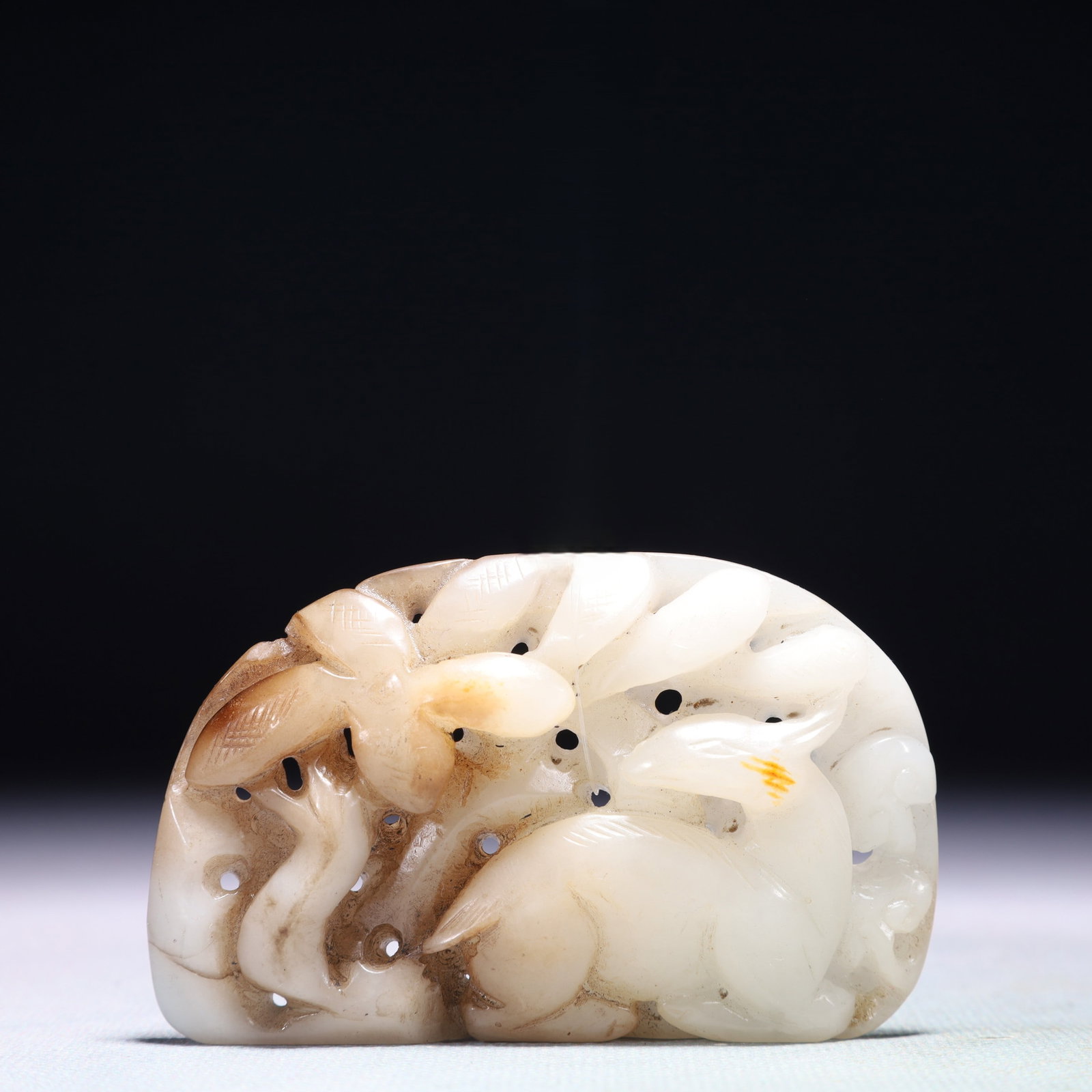 An Exquisite White Jade Deer Pattern Pendant: An Exquisite White Jade Deer Pattern Pendant,Qing Dynasty,China,Size:3.1inx2in,Weight:72.4g 白玉鹿纹佩,中国清代