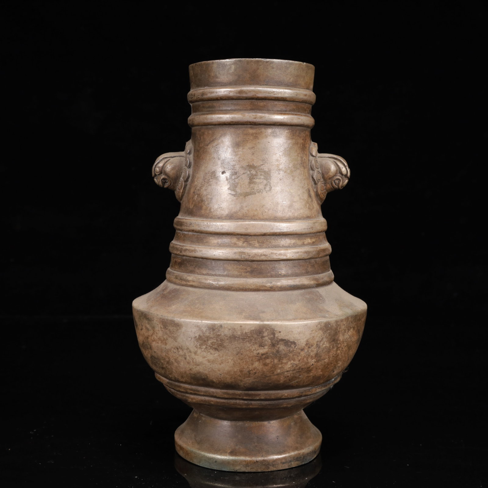 An Exquisite Silver-Plated Bronze Double-Ears Vase: An Exquisite Silver-Plated Bronze Double-Ears Vase,Ming Dynasty,China,Xuande Four-character Mark,Size:4.7inx7.9in,Weight:1250g 铜镀银双耳瓶,中国明