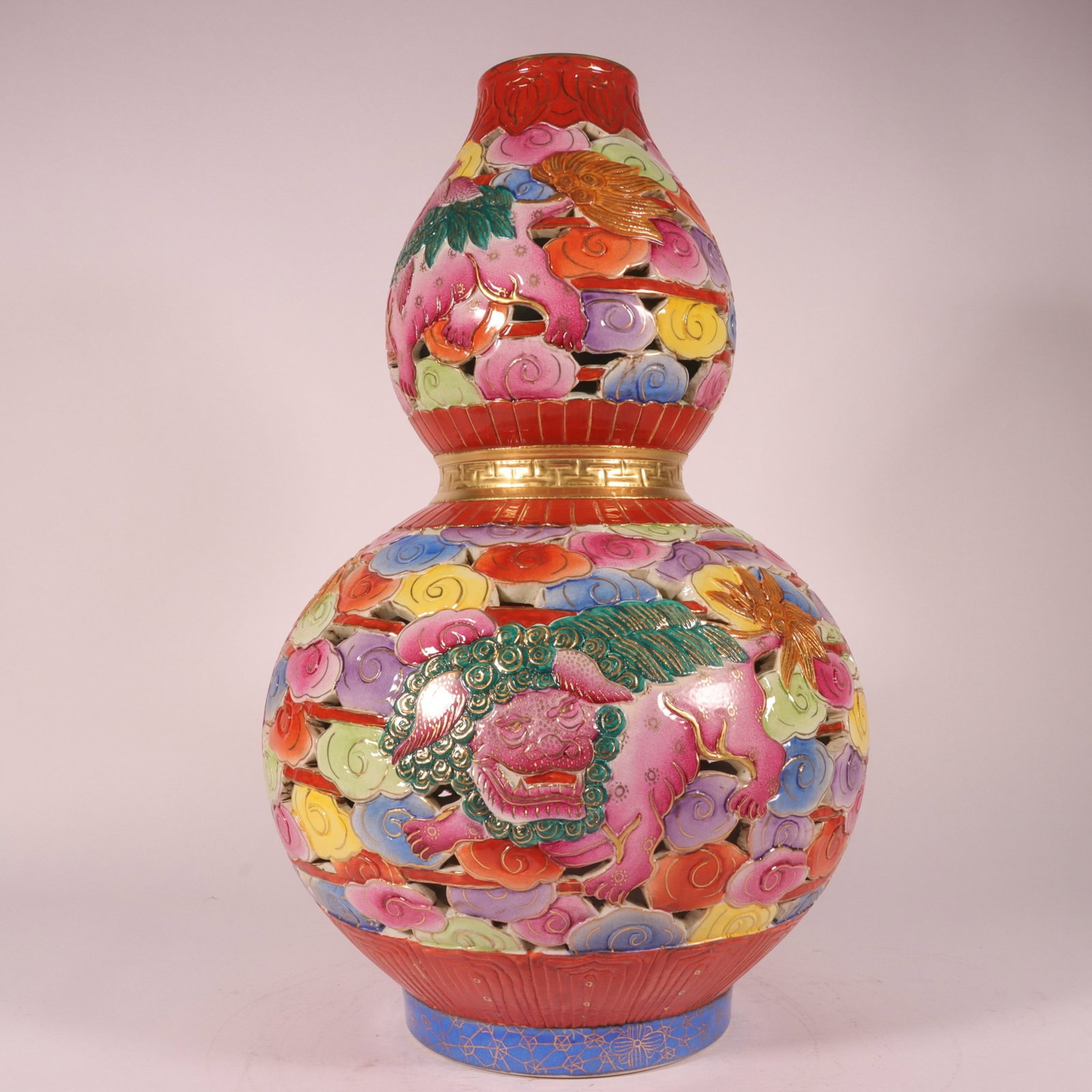 A Huge Enamel Painted Gold Lion Pattern Gourd-Shaped Vase: A Huge Enamel Painted Gold Lion Pattern Gourd-Shaped Vase,Qing Dynasty,China,Qianlong Six-character Mark,Size:16.9inx9.1in