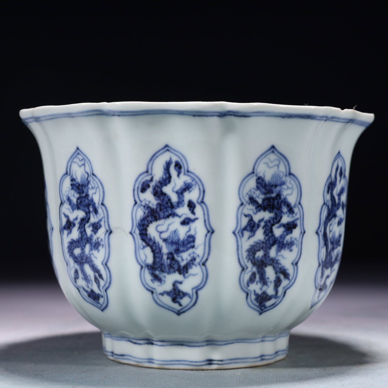 An Exquisite Blue and White Auspicious Cloud and Dragon Pattern Bowl: An Exquisite Blue and White Auspicious Cloud and Dragon Pattern Bowl,Ming Dynasty,China,Xuande Six-character Mark,Size:6.1inx4.3in,Weight:650g 青花祥云龙纹碗,