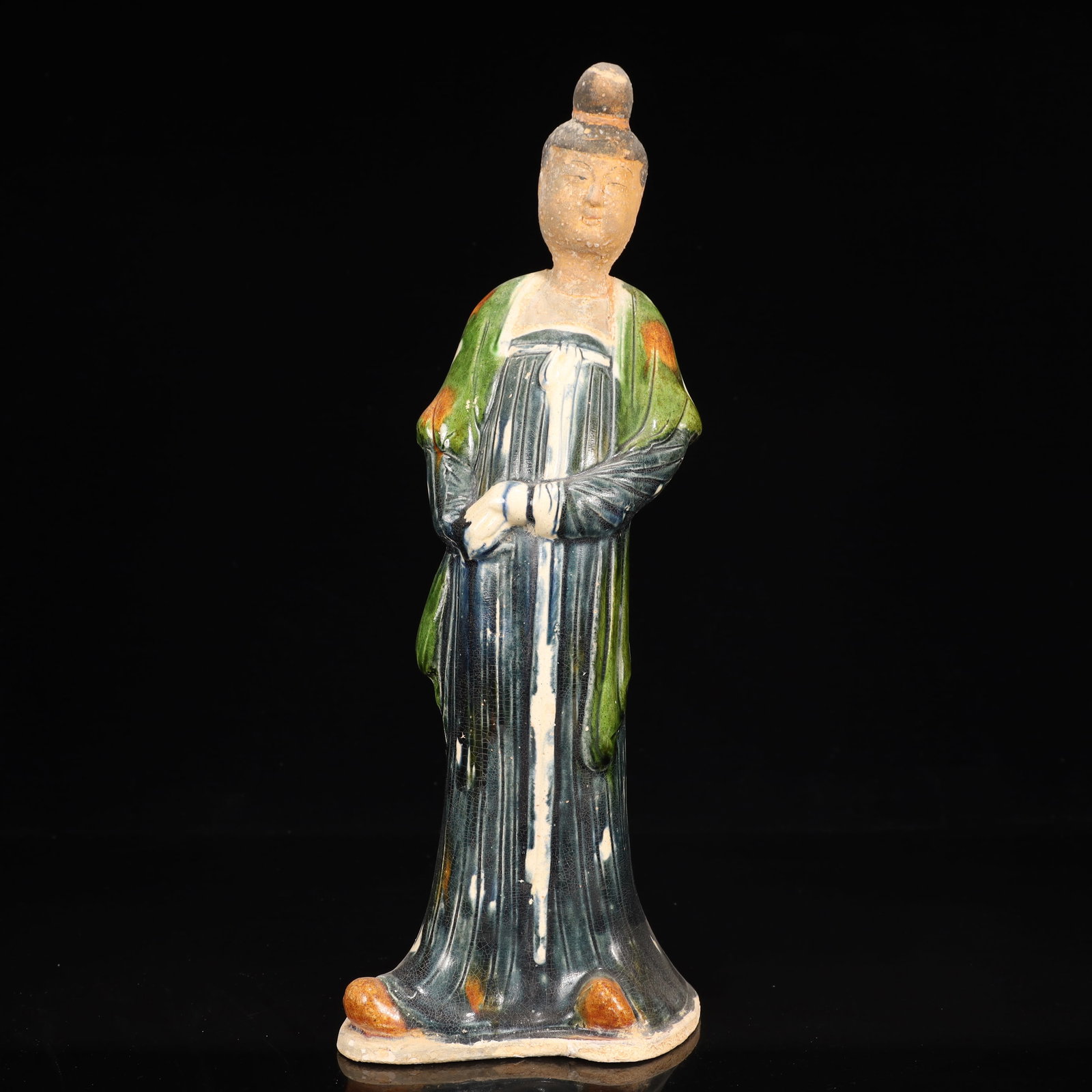 A Rare Tang Tri-Color Glazed Pottery Woman Ornament: A Rare Tang Tri-Color Glazed Pottery Woman Ornament,Tang Dynasty, China,Chinese Tang Tri-colored Pottery, or Tang Sancai, flourished during the Tang Dynasty (618–907 AD). It's renowned for its v