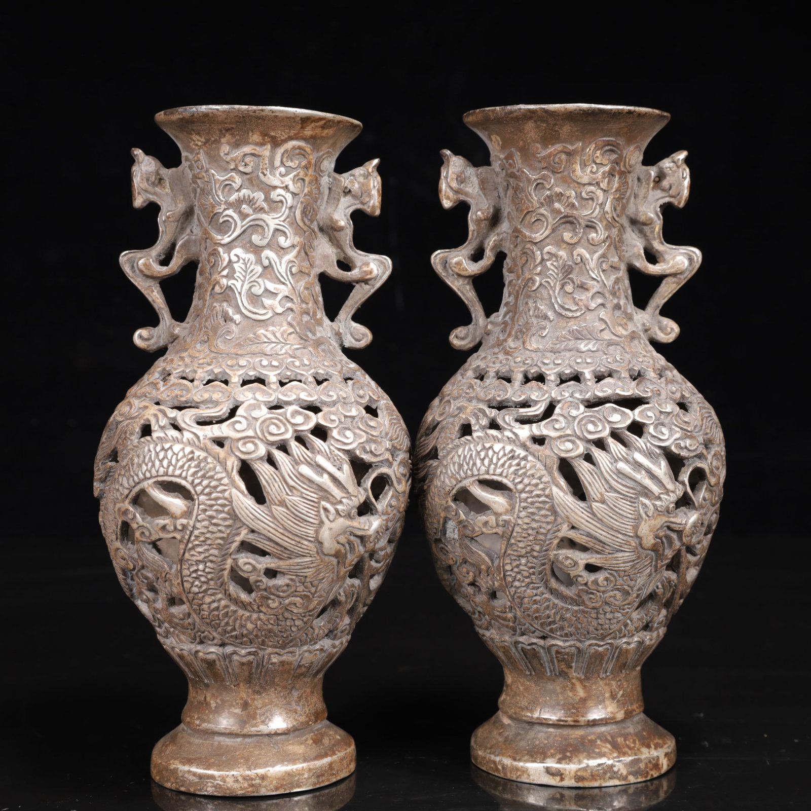A Pair of Exquisite Silver-Plated Bronze Dragon and Phoenix Pattern Double-Ears Vases: A Pair of Exquisite Silver-Plated Bronze Dragon and Phoenix Pattern Double-Ears Vases,Qing Dynasty,China,With Mark,Size:3.1inx7.1in,Weight:1100g 一对铜镀银龙凤