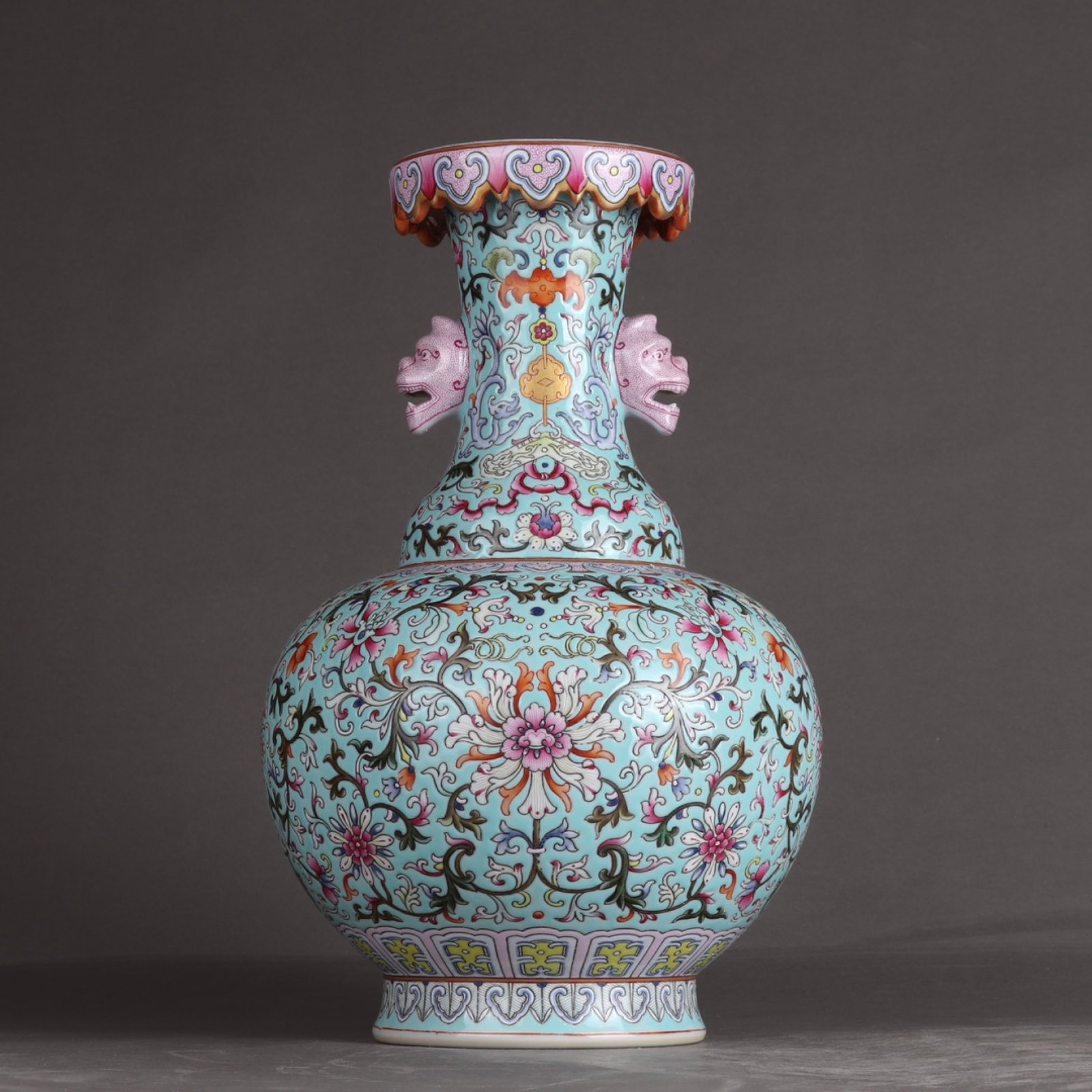 A Rare Turquoise Glazed Famille-Rose Lotus Pattern Beast-Ears Vase: A Rare Turquoise Glazed Famille-Rose Lotus Pattern Beast-Ears Vase,Qing Dynasty,China,Qianlong Six-character Mark,Size:12.2inx7.7in 松石绿釉粉彩缠枝!